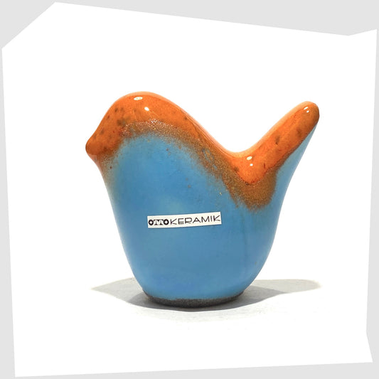 otto keramik ceramic bird ornament in orange over light blue glaze