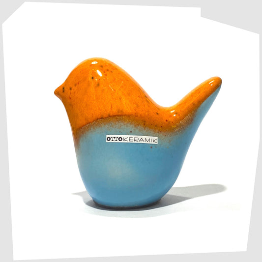 otto keramik ceramic bird ornament in orange over light blue glaze