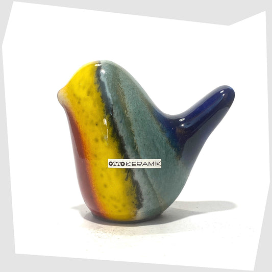 otto keramik ceramic bird sculpture in multicoloured rainbow glaze shown on a white background