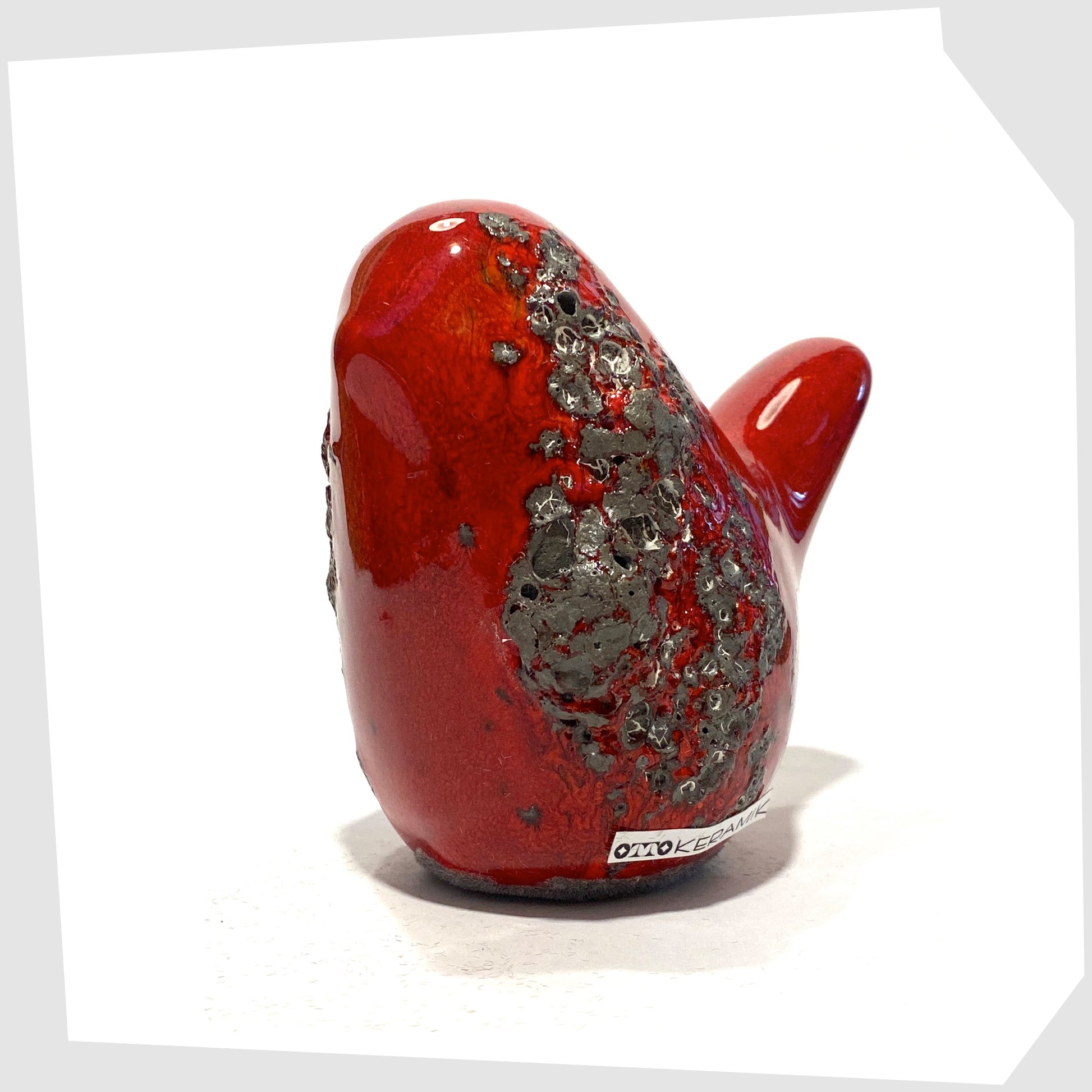 otto keramik ceramic bird figurine in red with grey fat lava glaze.