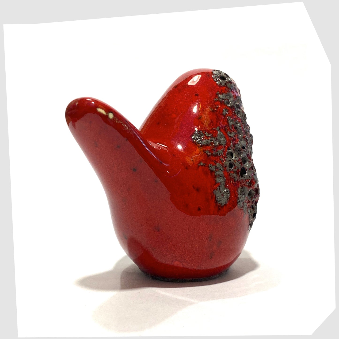 otto keramik ceramic bird sculpture in red with grey fat lava glaze.