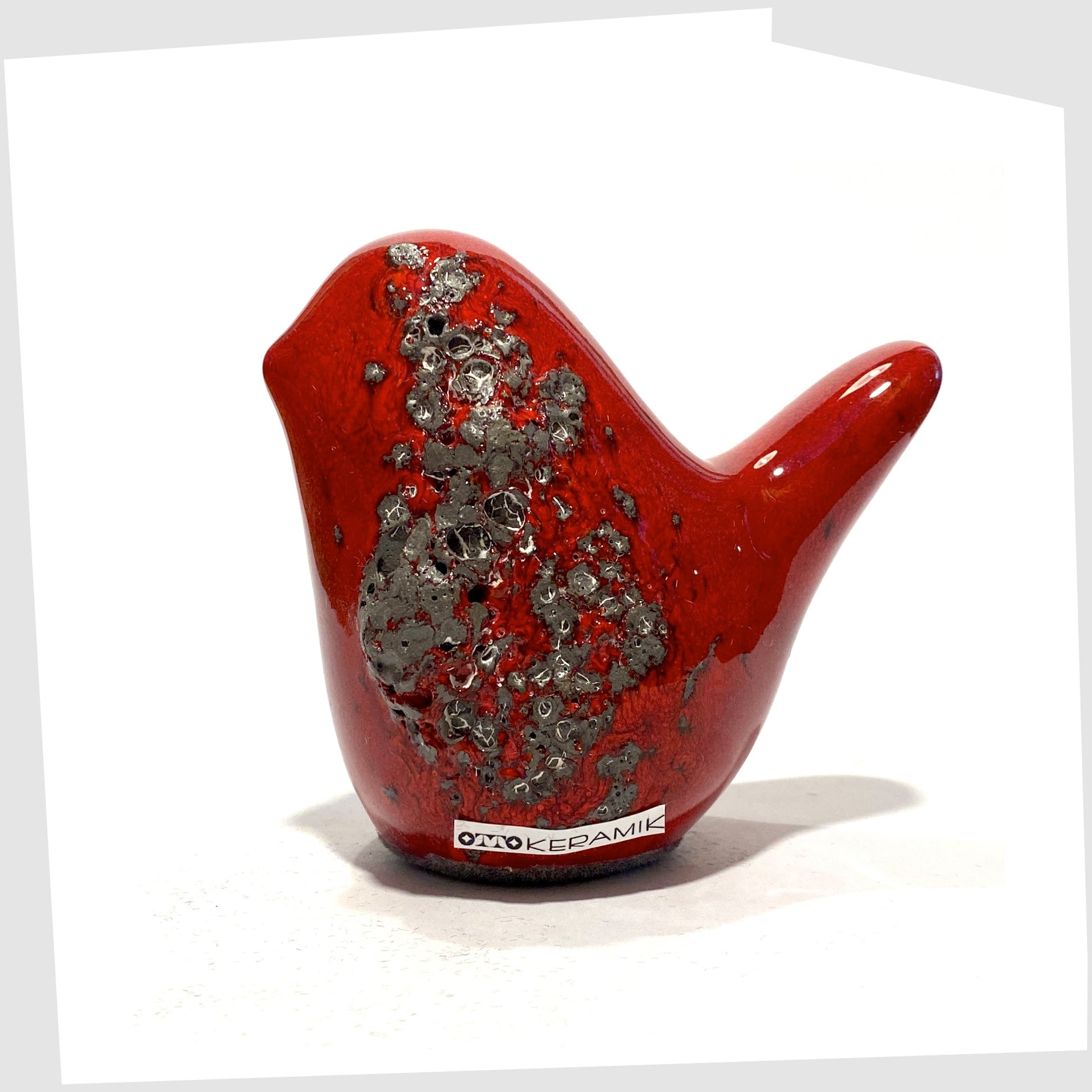otto keramik ceramic bird in red with grey fat lava glaze.