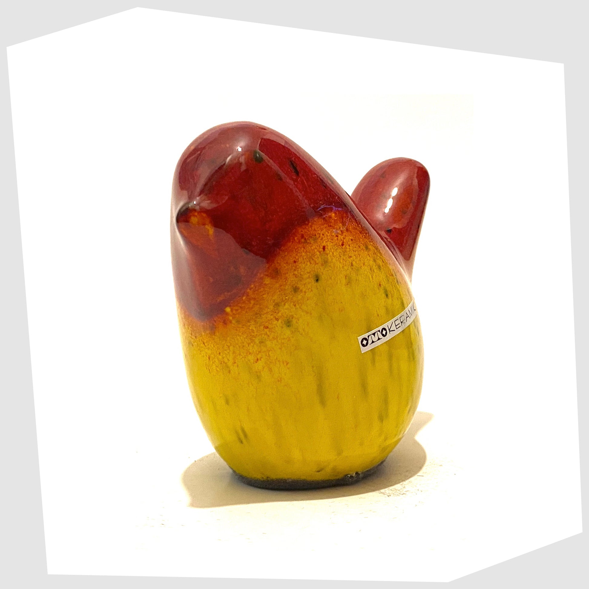 otto-keramik-ceramic-bird-in-red-over-yellow-drip-glaze