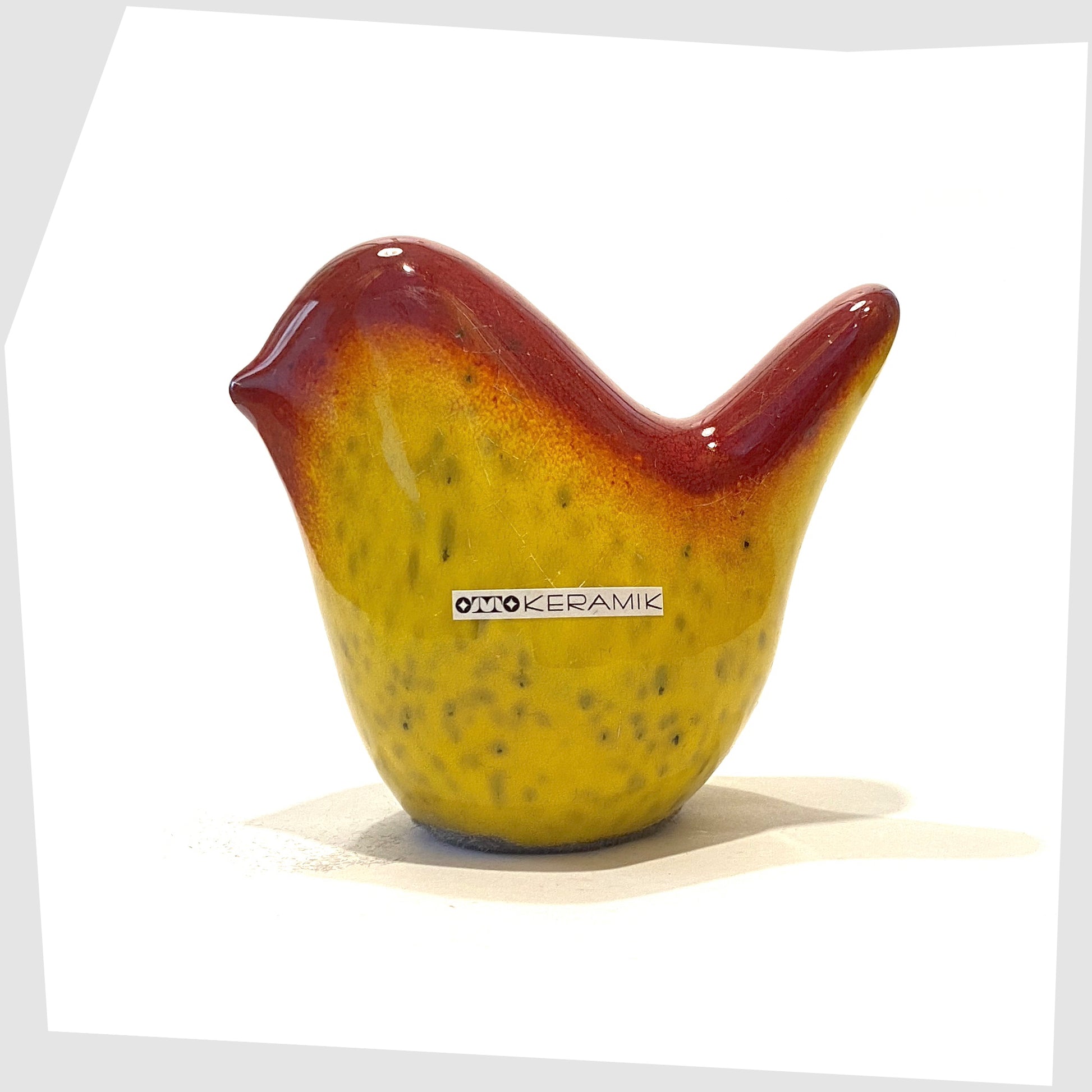 otto keramik ceramic bird in vibrant red over yellow glaze