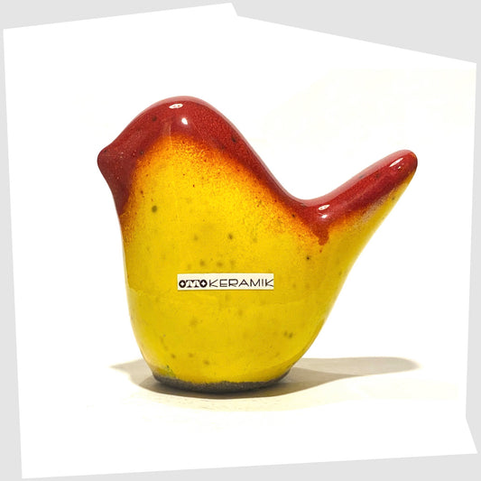 otto keramik bird in red over yellow block glaze