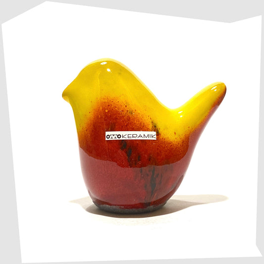 otto keramik ceramic bird ornament in bold yellow over red glaze