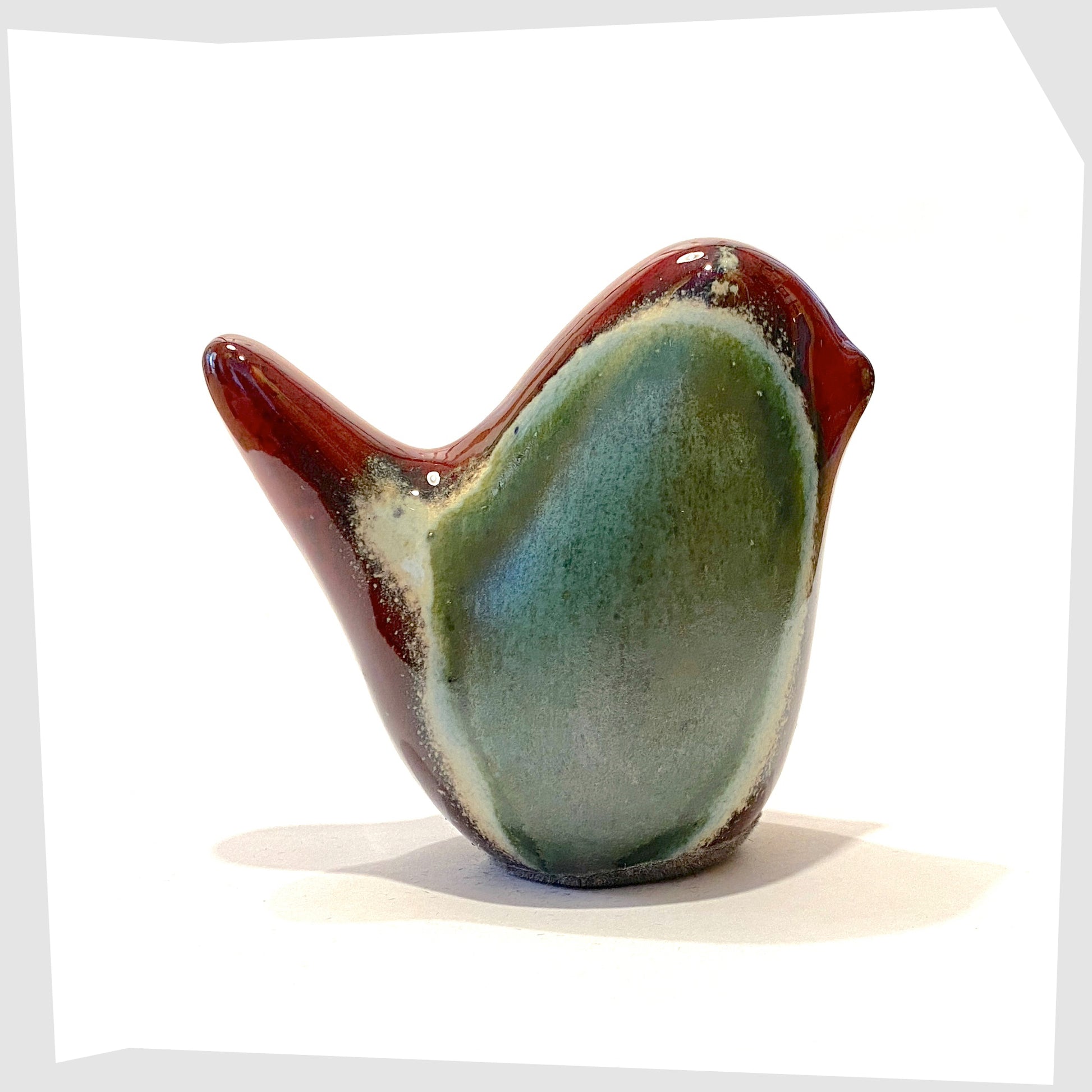 bolivia glazed otto keramik ceramic bird in red and sea green