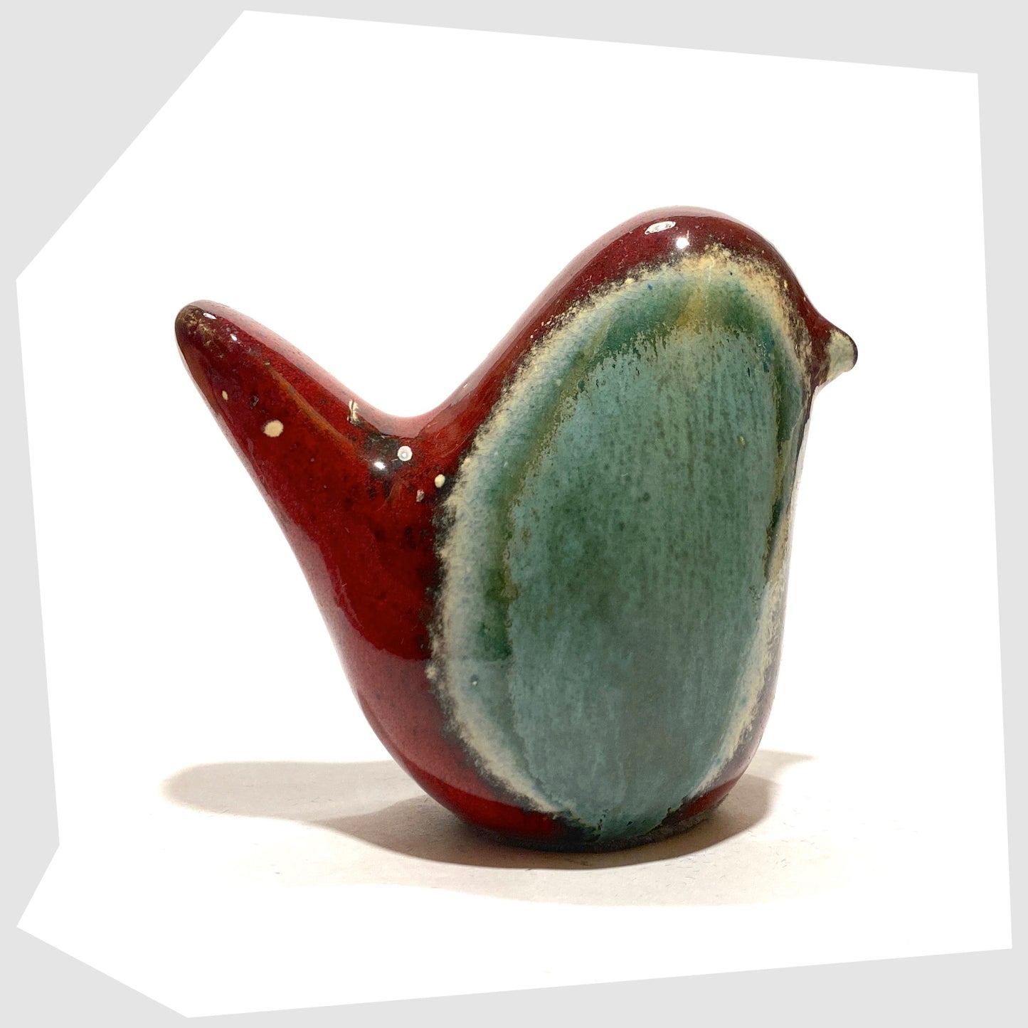bolivia glazed otto keramik ceramic bird in red and sea green