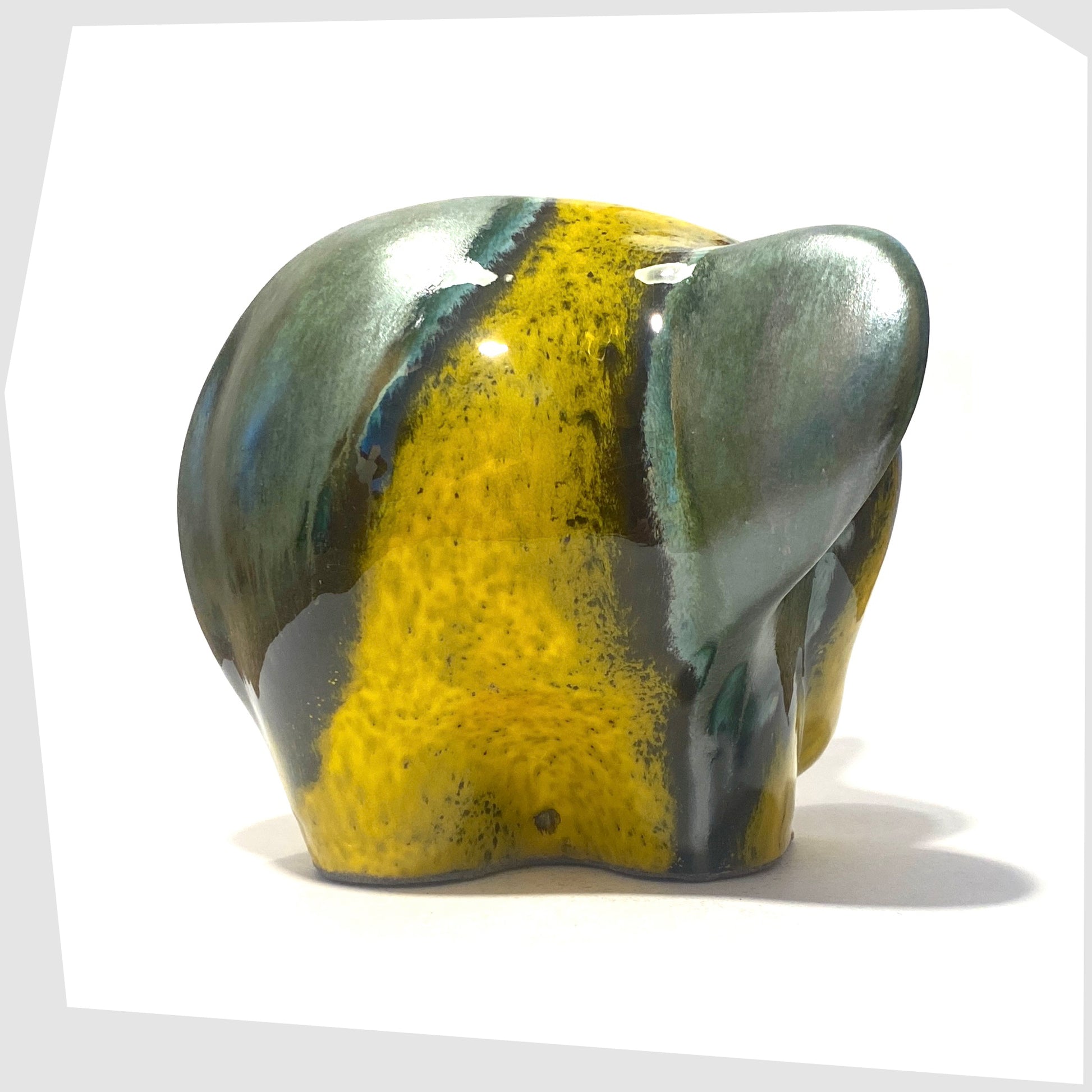 otto keramik ceramic elephant in Brazil glaze of vibrant yellow and rich sea green