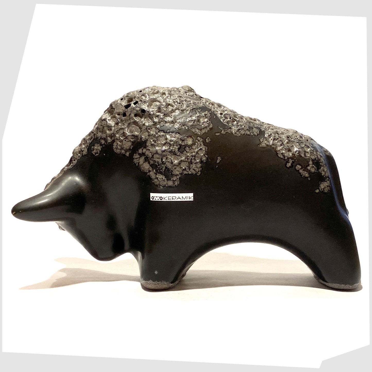 otto keramik bull in matte black with a textured band of fat lava glaze