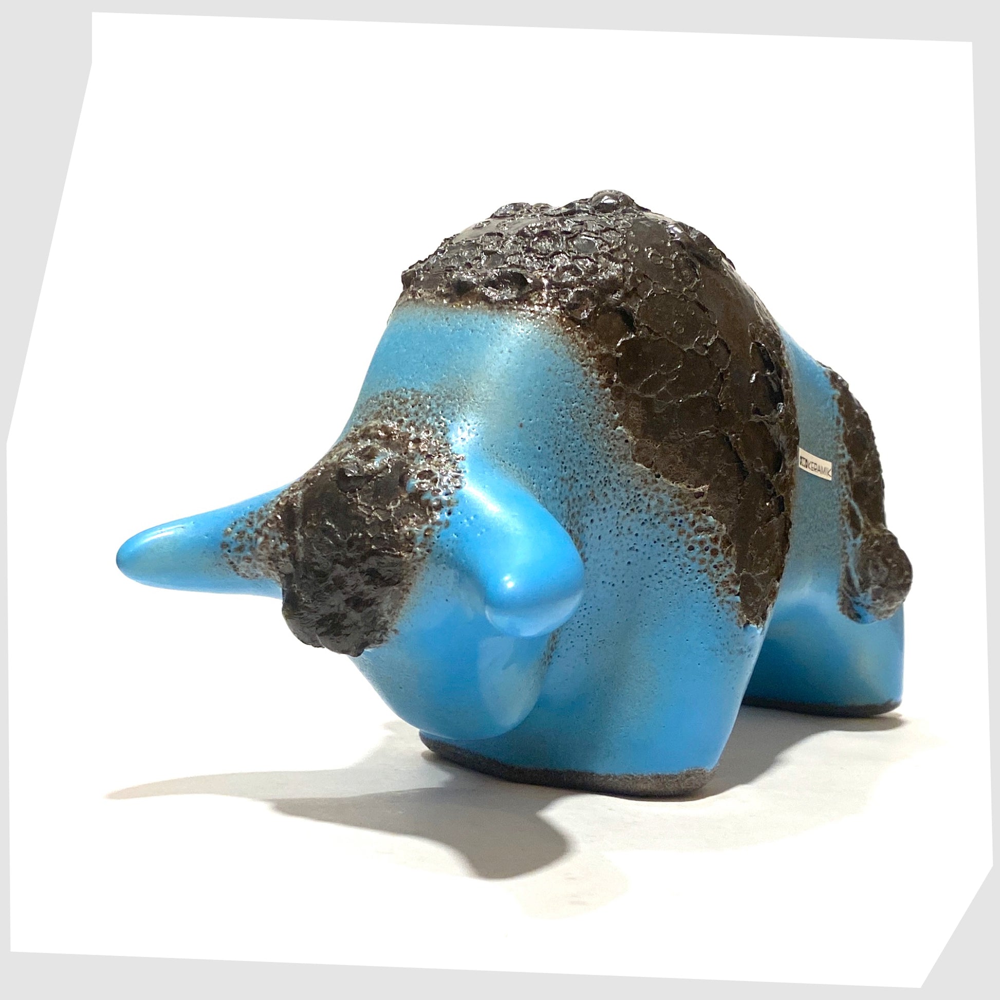 front horns of the otto keramik bull in light blue glaze with striped of deep fat lava glaze