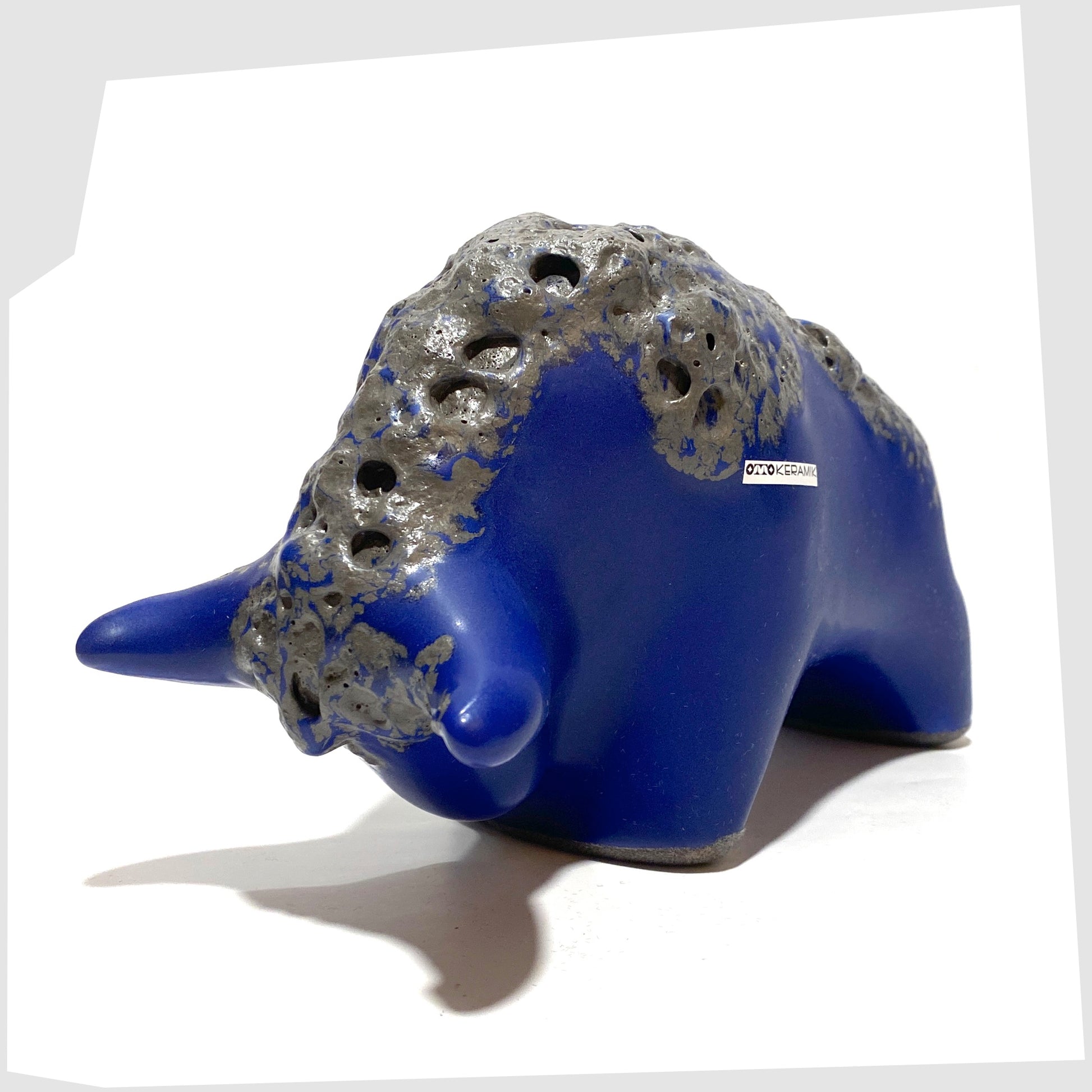 Otto Keramik bull in blue glaze with a band of textured fat lava glaze
