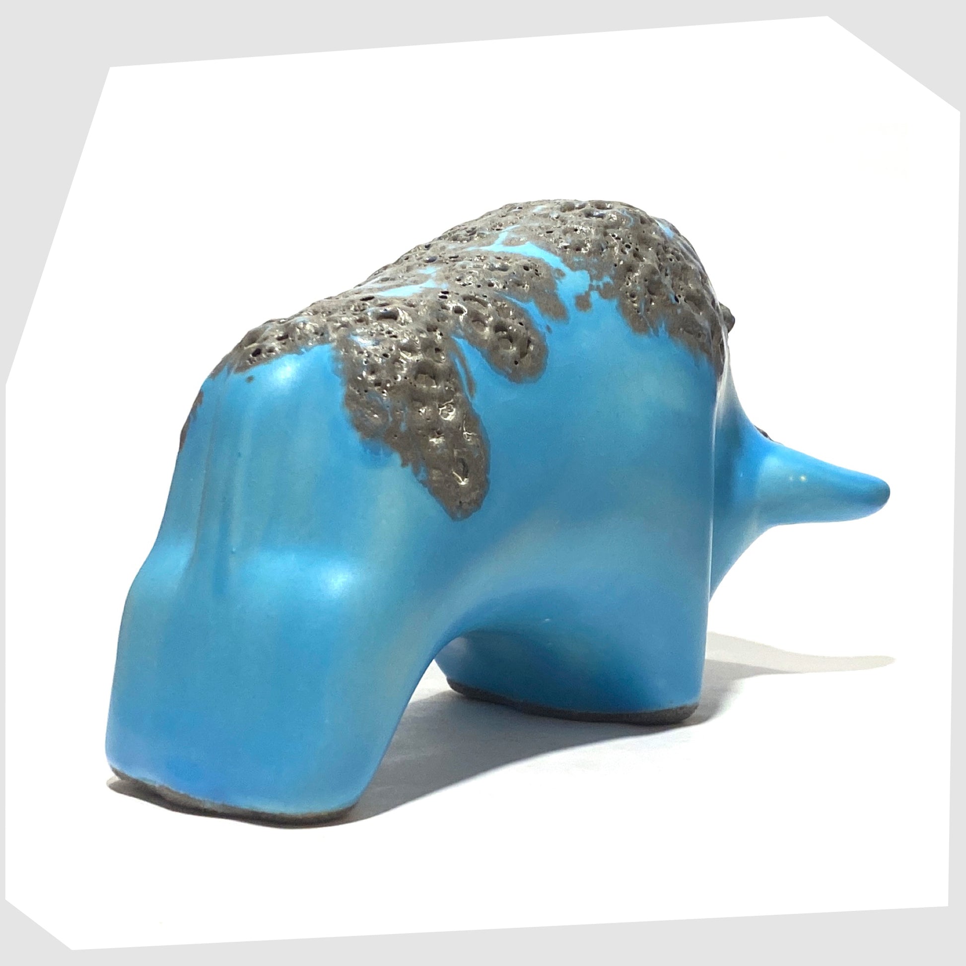 rear of the otto keramik bull in light blue glaze with grey fat lava