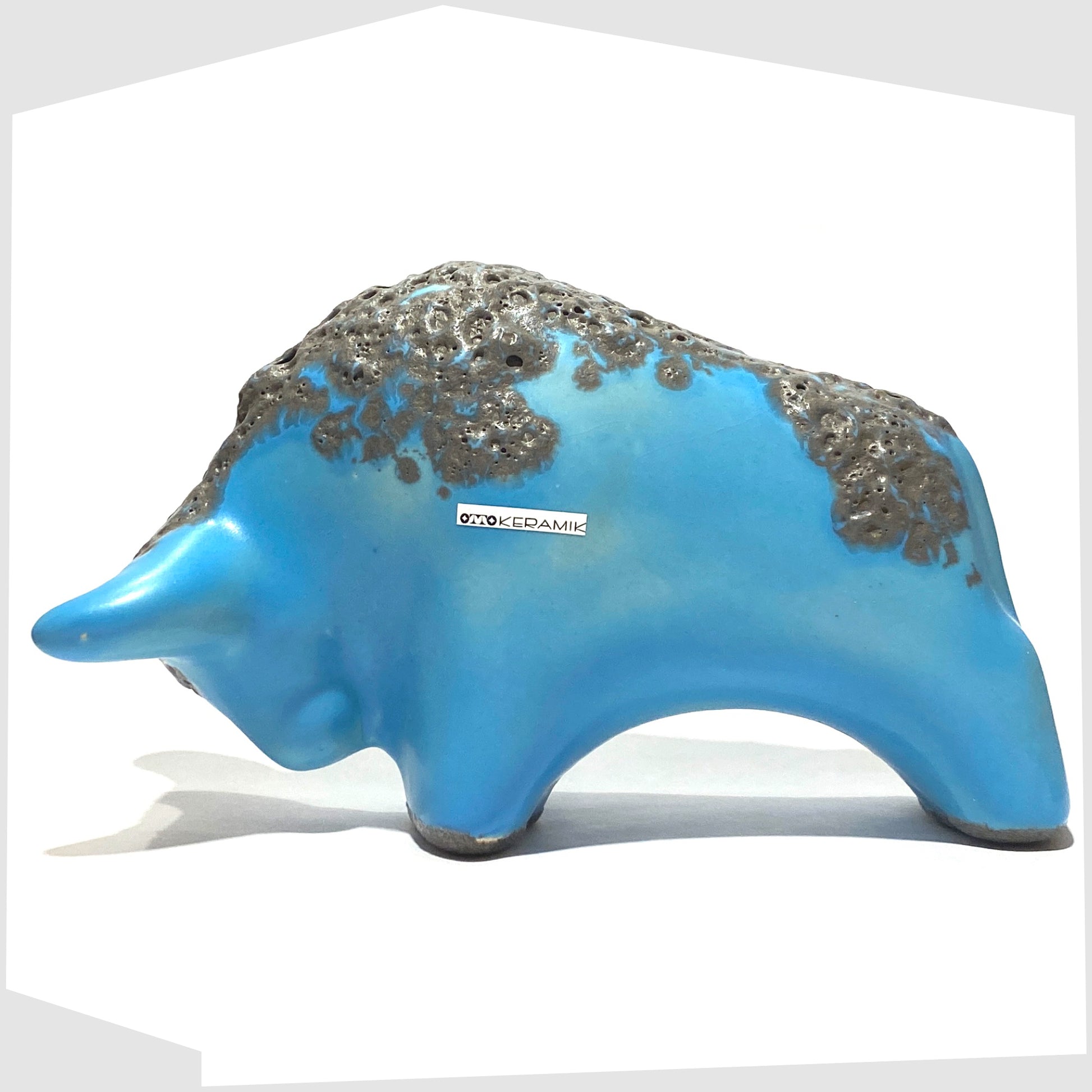 otto keramik bull in light blue glaze with grey fat lava