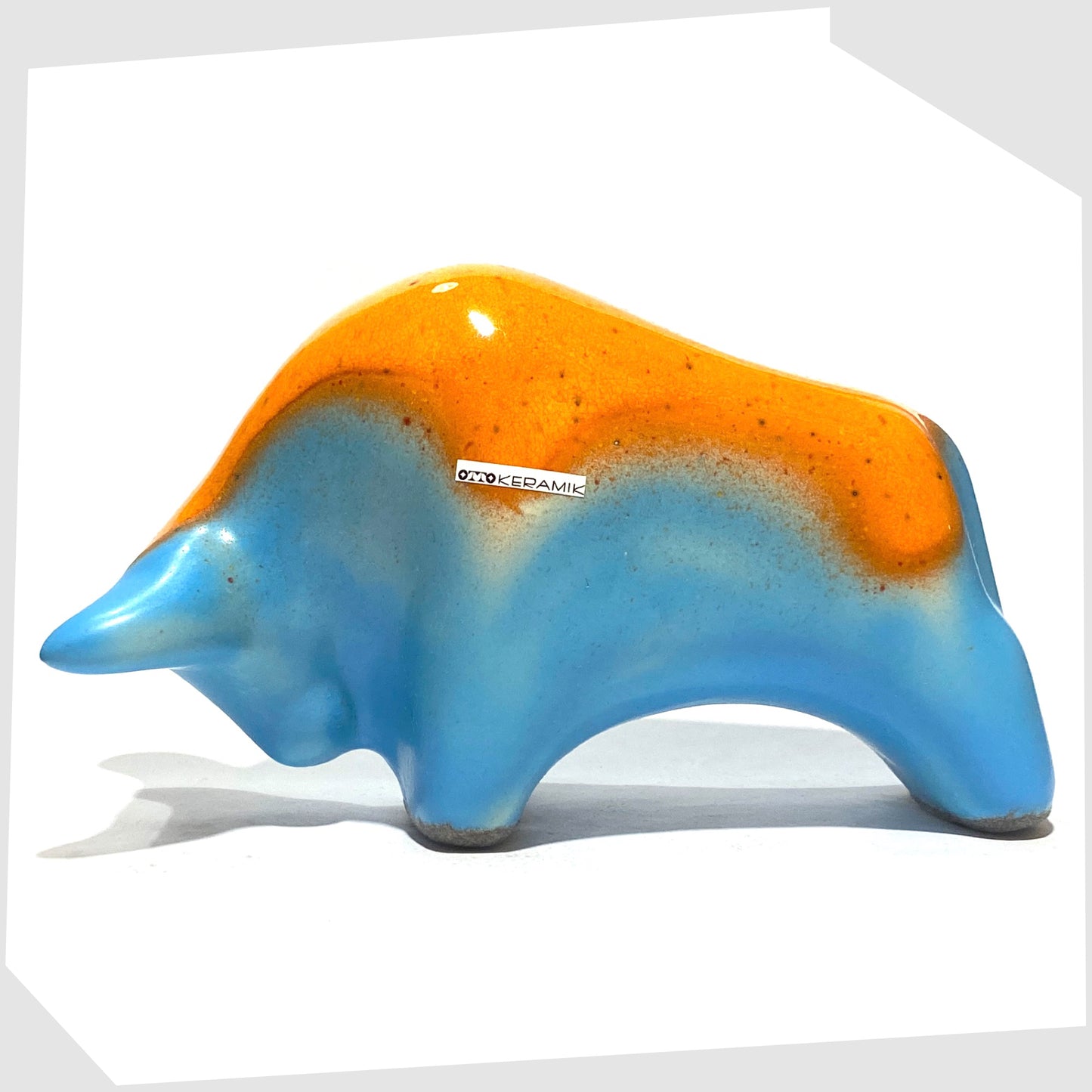 otto keramik ceramic bull in orange over blue glaze