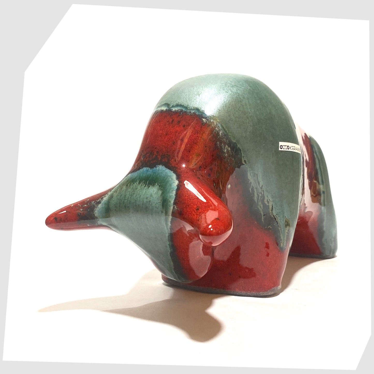 bolivia glazed otto keramik ceramic bull in rich red and sea green drip glaze