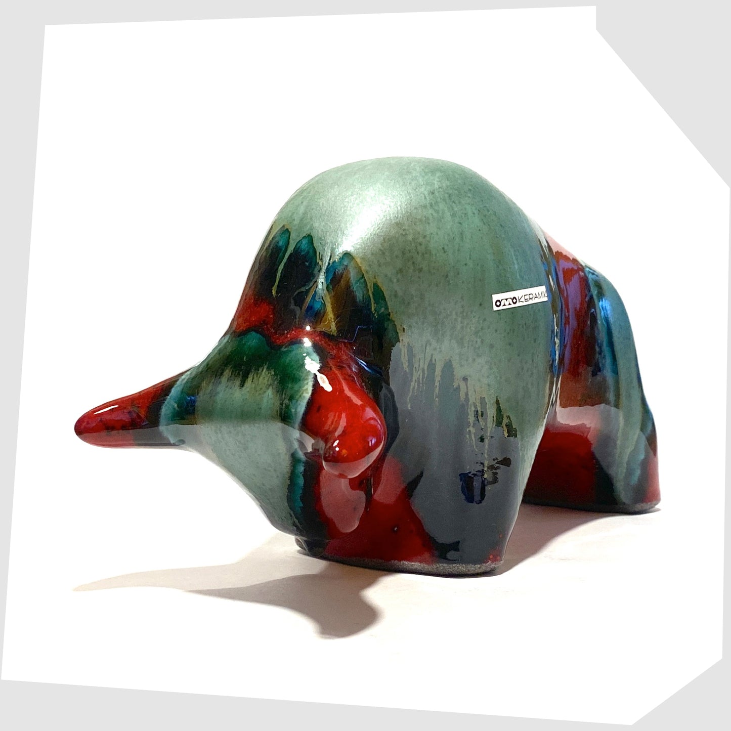 bolivia glazed otto keramik ceramic bull in rich red and sea green drip glaze