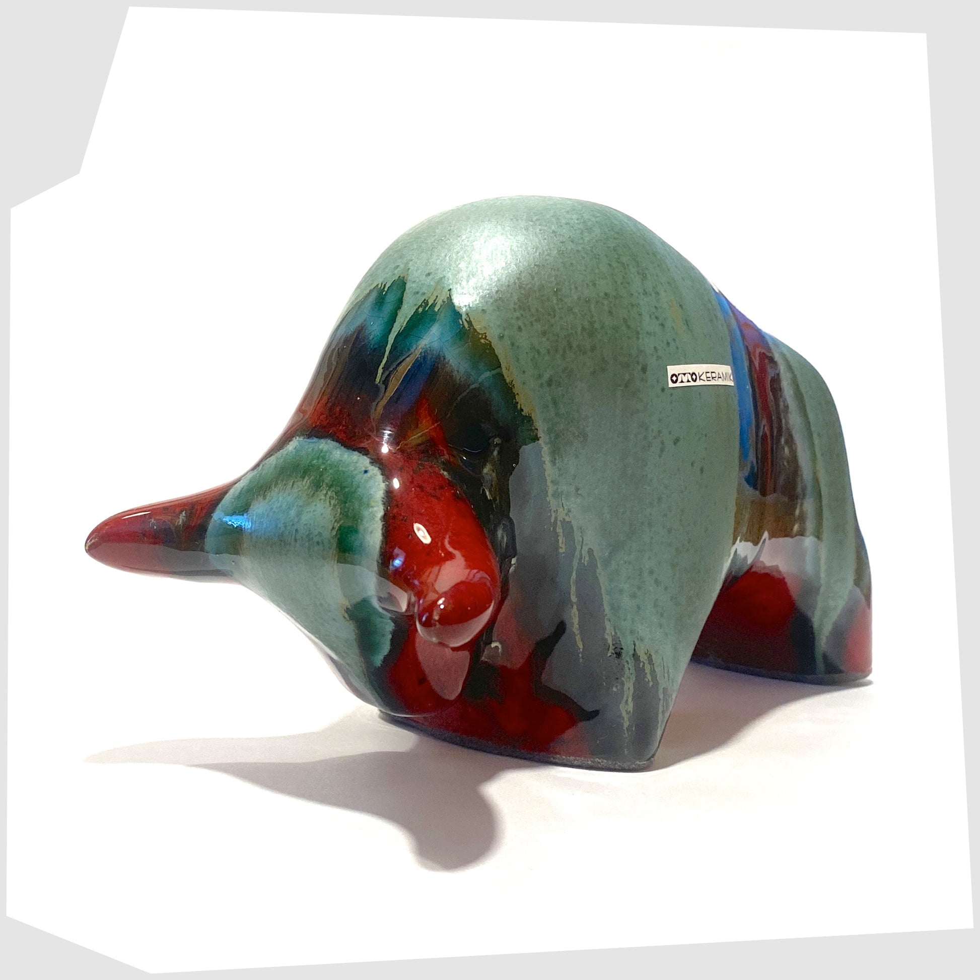 bolivia glazed otto keramik ceramic bull in rich red and sea green drip glaze