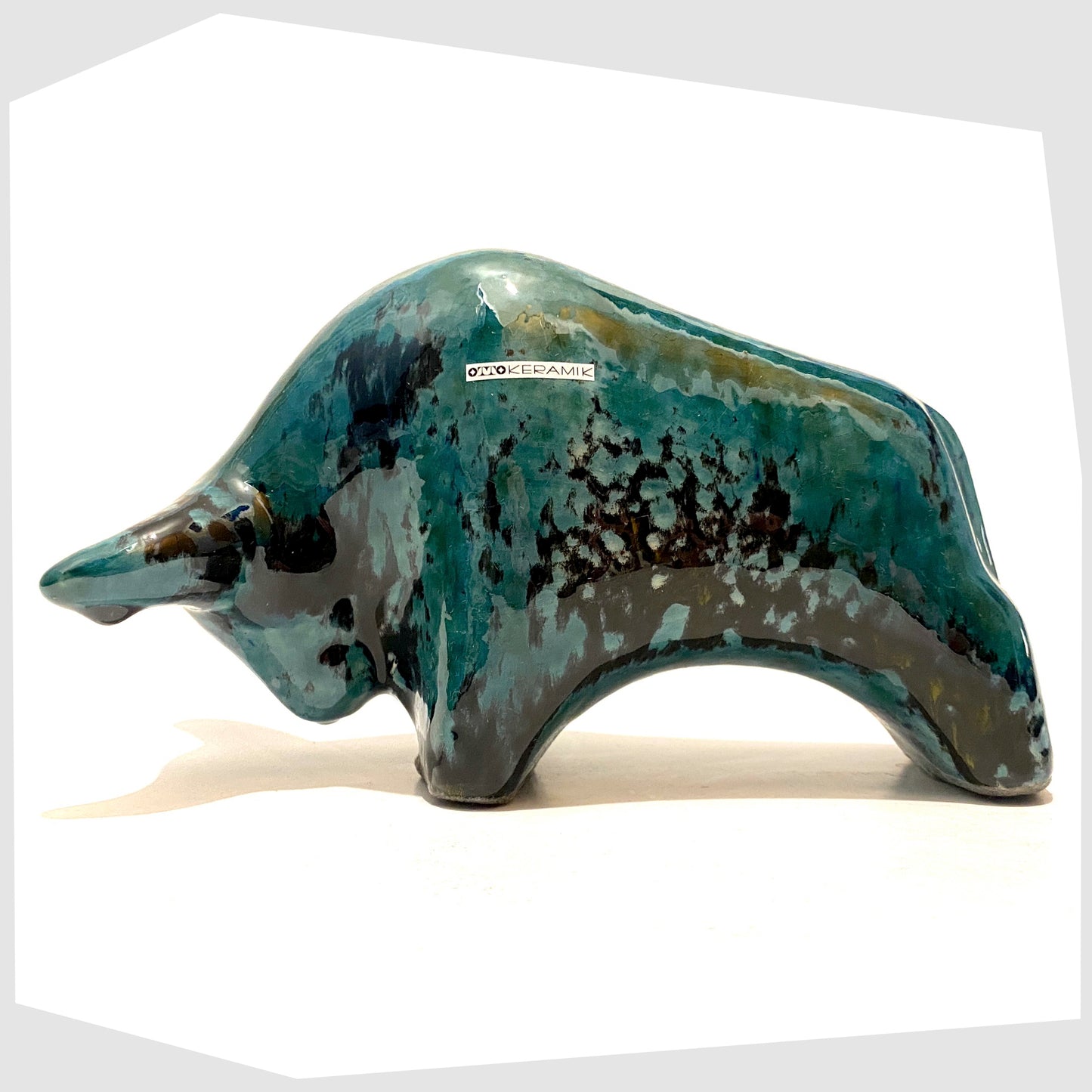 otto-keramik-ceramic-bull-in-ecuador-glaze-of-teal-blues-and-greens-on-a-black-base