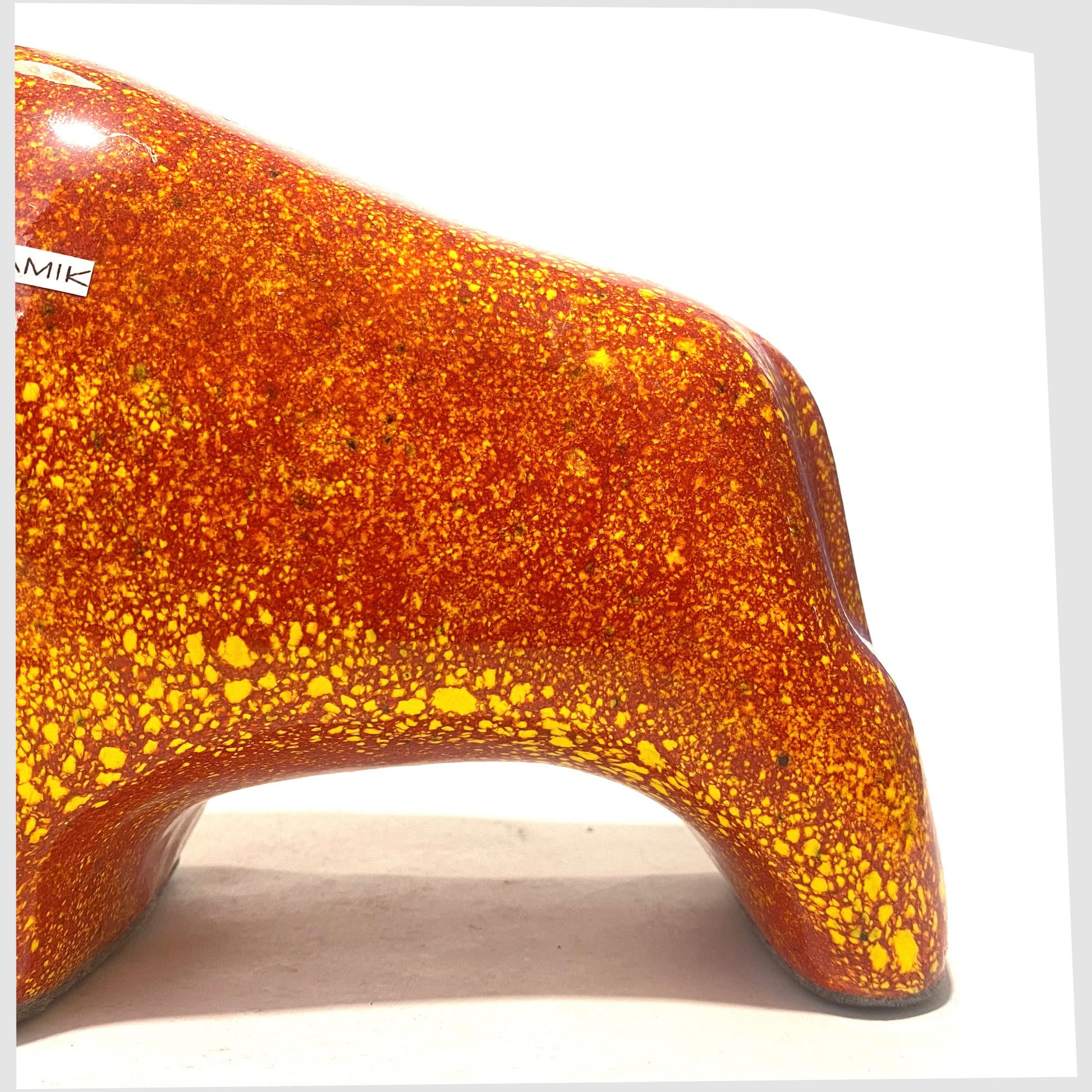 close up of the glaze on the Otto Keramik Bull in Fire colour way