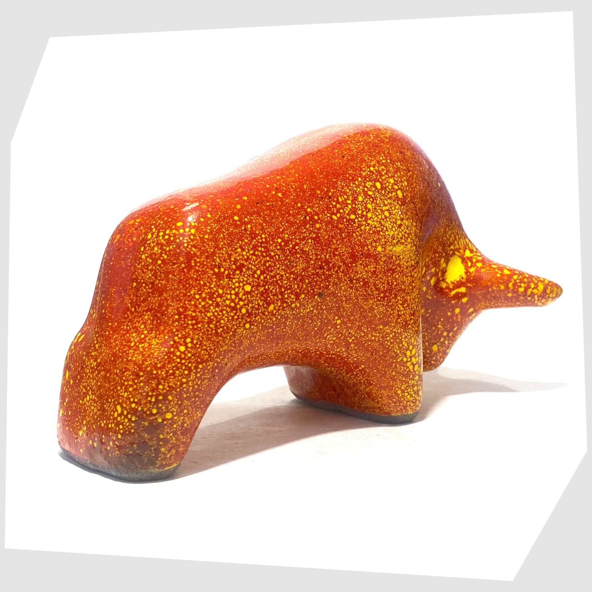 rear of the otto keramik ceramic bull in fire glaze of red, orange and yellow flecks