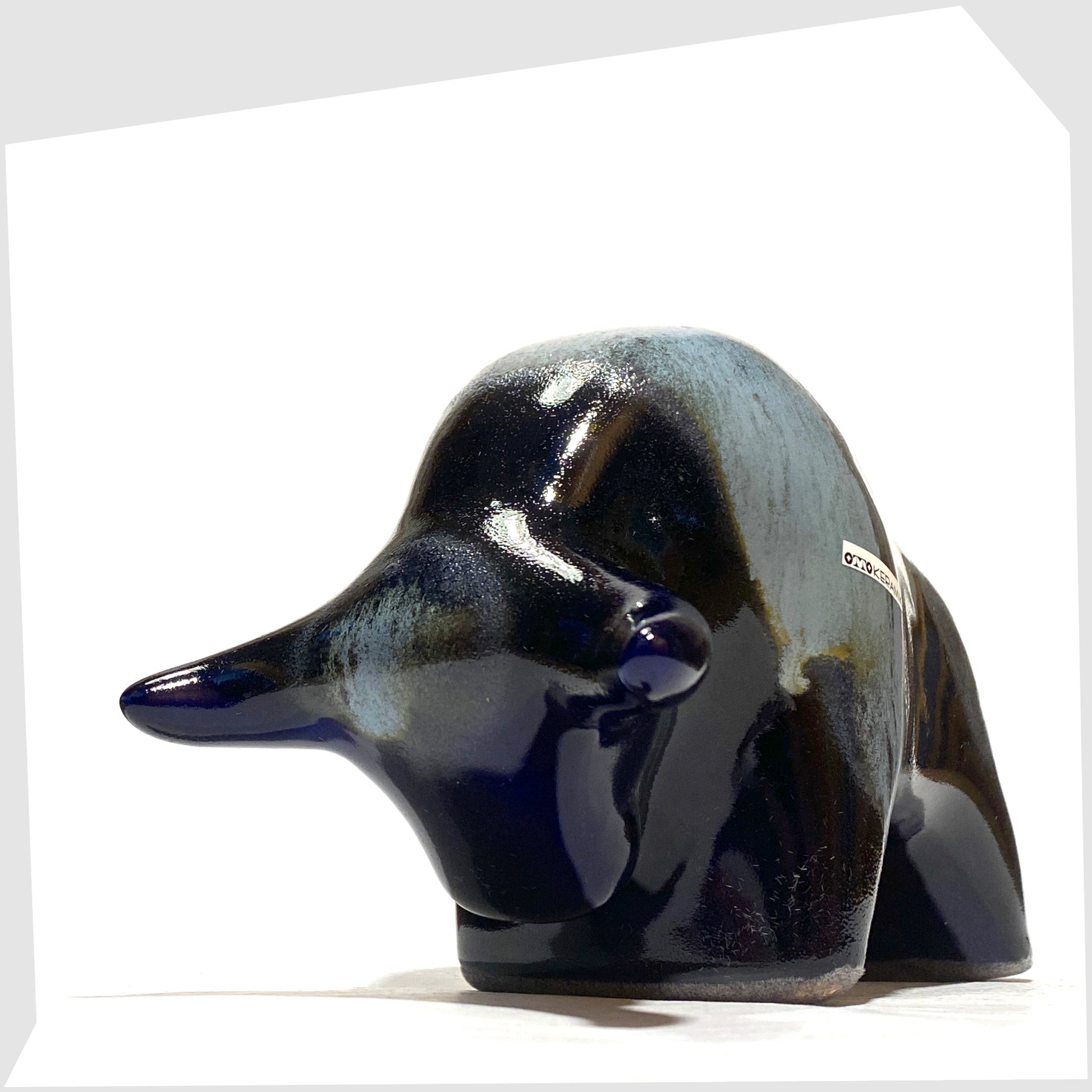 Front of the Otto Keramik Ceramic Bull in navy and blue Kreta glaze, shown on a white background