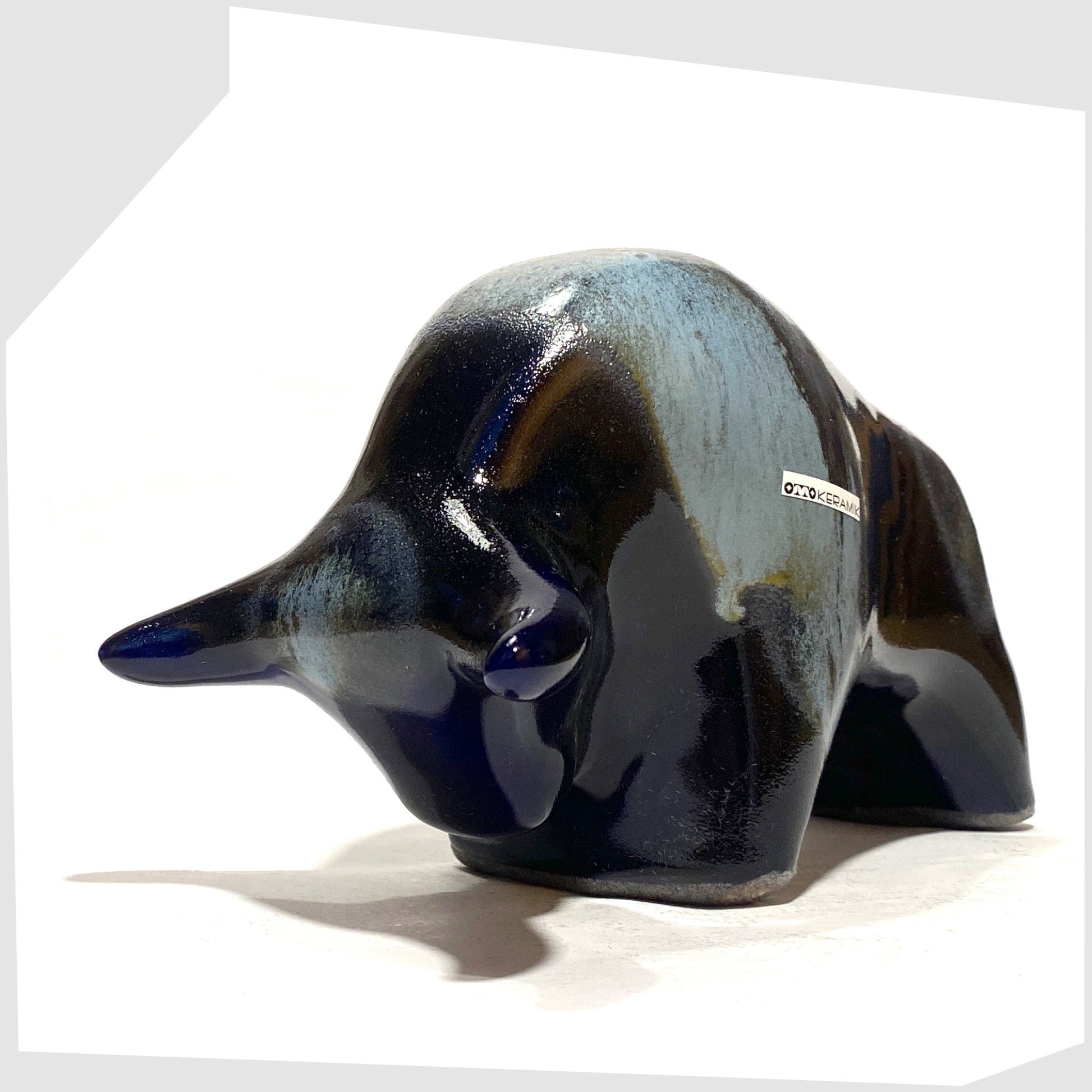 Front of the Otto Keramik Ceramic Bull in navy and blue Kreta glaze, shown on a white background