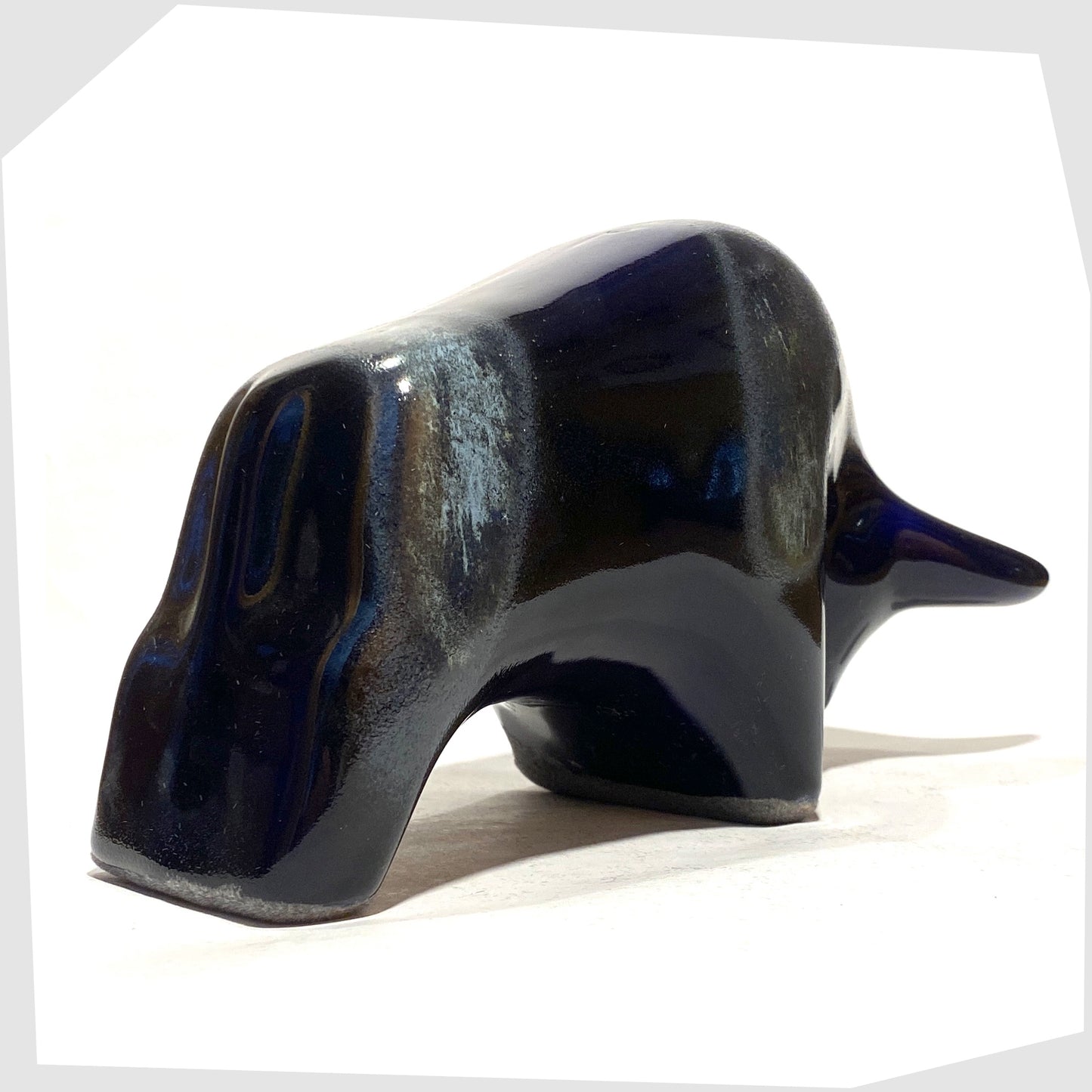 Rear of the Otto Keramik Ceramic Bull in navy and blue Kreta glaze, shown on a white background
