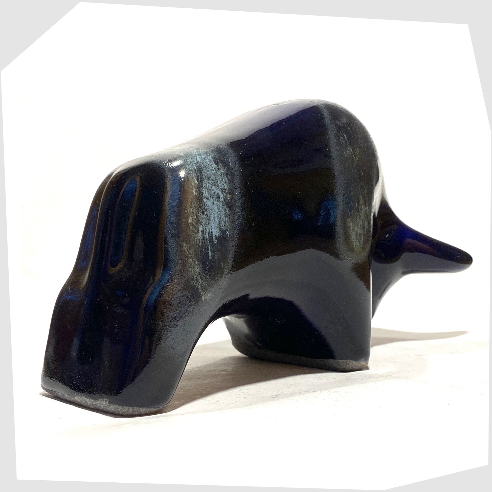 Rear of the Otto Keramik Ceramic Bull in navy and blue Kreta glaze, shown on a white background