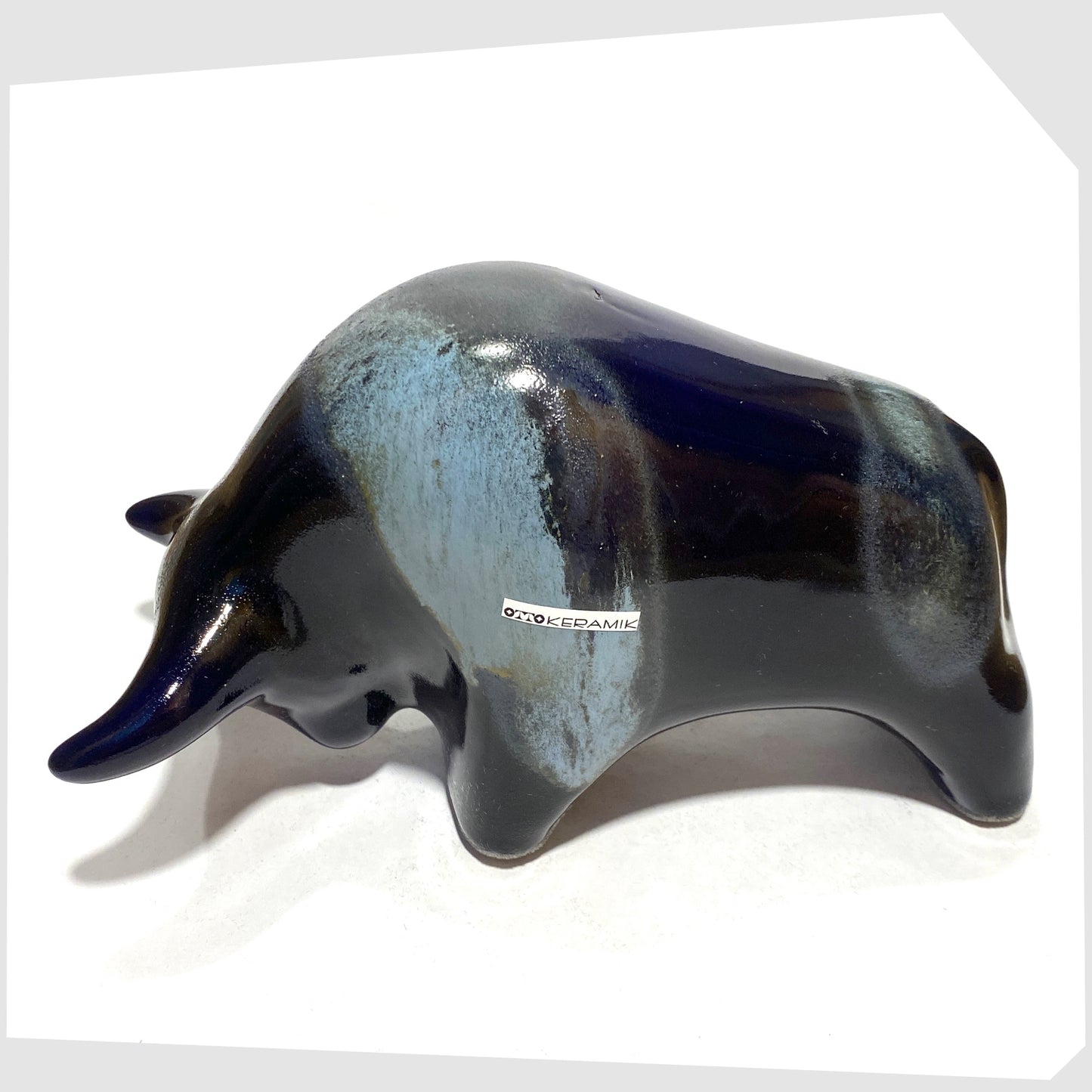 Overhead view of the Otto Keramik Ceramic Bull in navy and blue Kreta glaze, shown on a white background