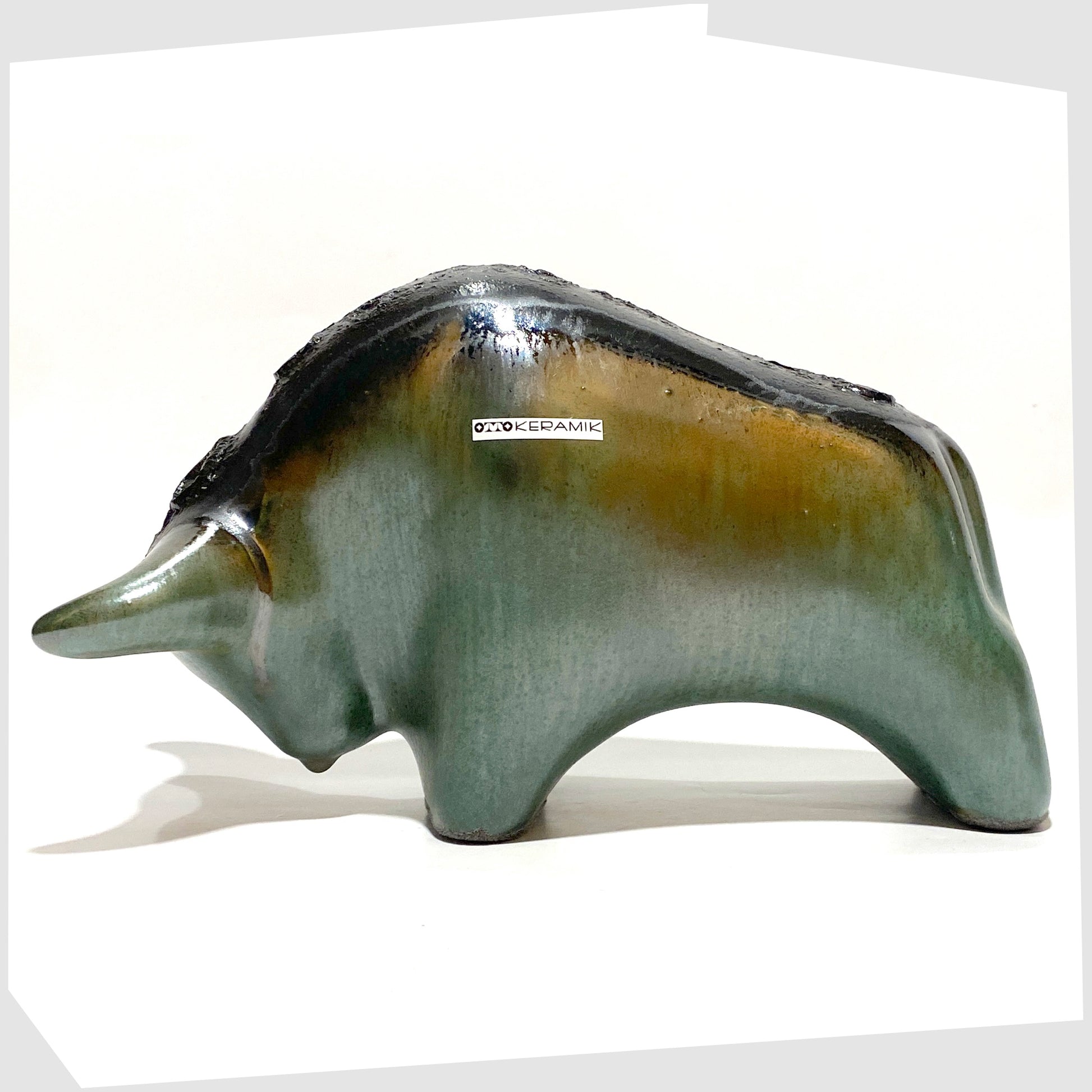 otto keramik ceramic bull sculpture in malta glaze of rich sea green with black fat lava