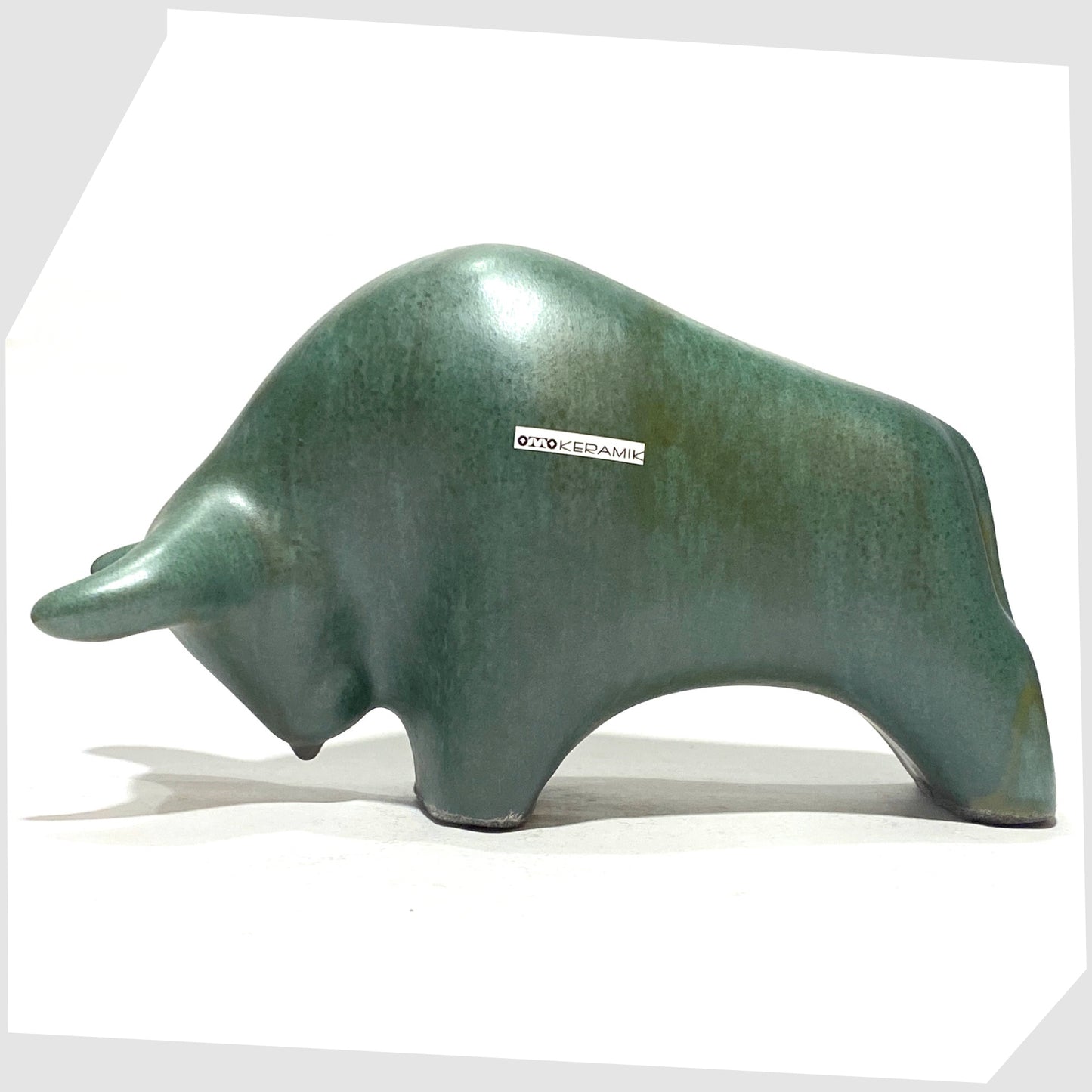 otto keramik ceramic bull glazed in the Malta glaze of rich sea green