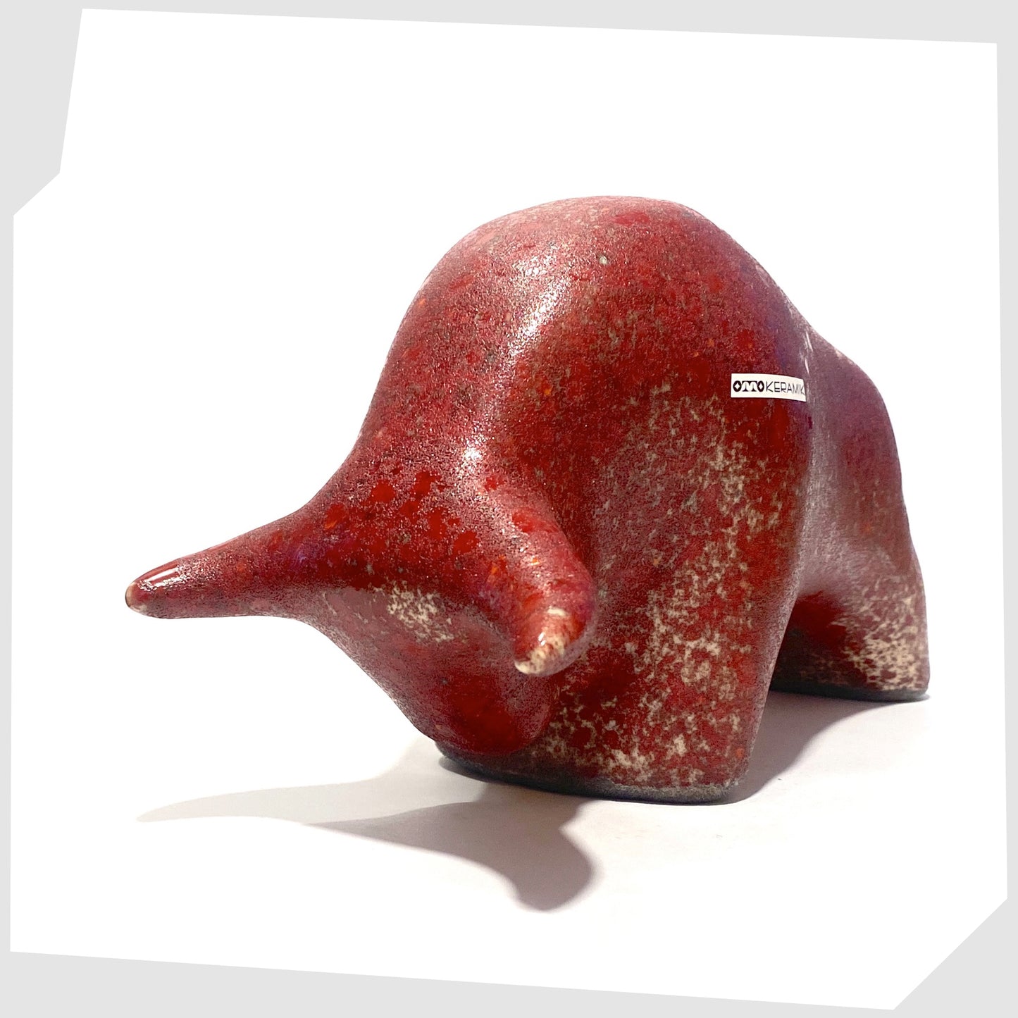 otto keramik ceramic bull ornament in rich red and sand speckled glazing