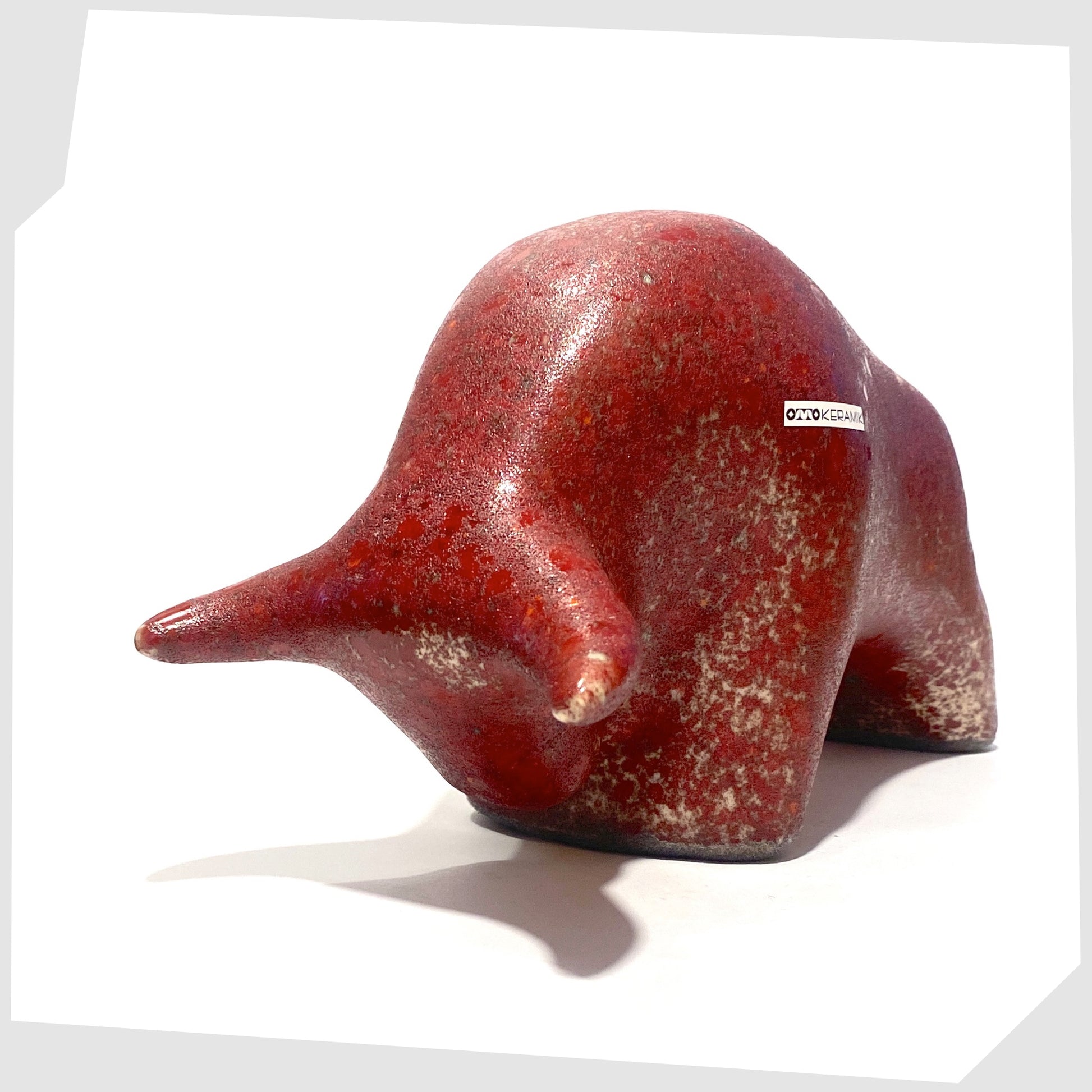 otto keramik ceramic bull ornament in rich red and sand speckled glazing