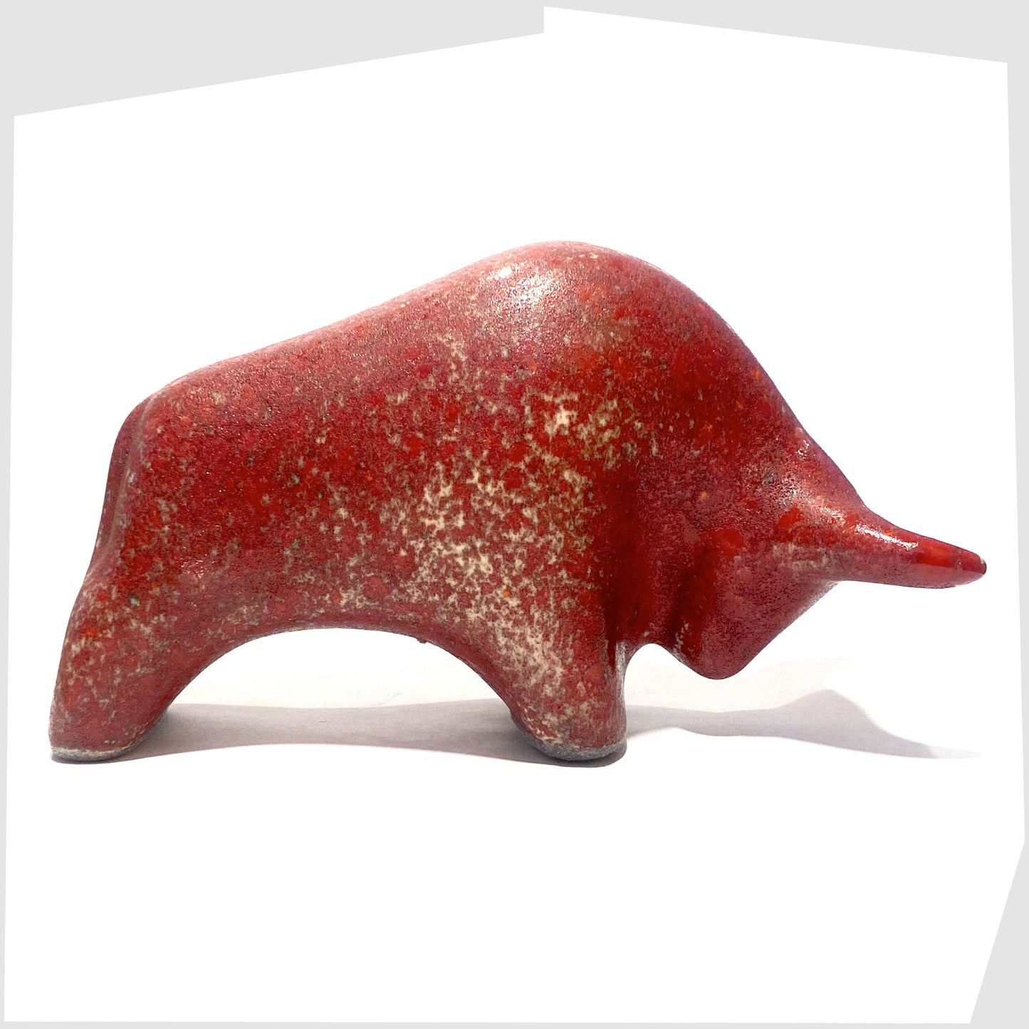 ceramic bull sculpture in red and sand speckle glaze by otto keramik