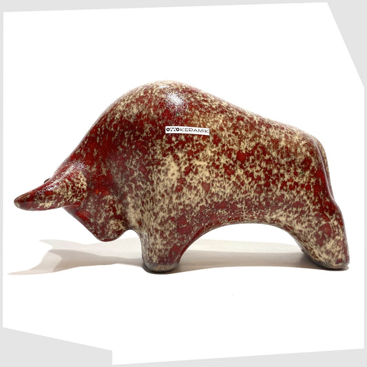 otto keramik bull in textured molten glaze of red and beige speckles 