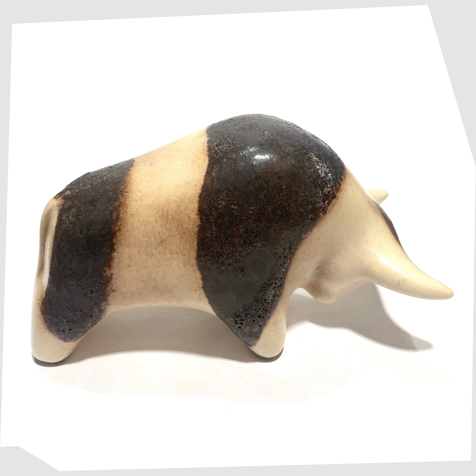 top of the Otto Keramik Bull in natural glaze with bands of dark brown fat lava