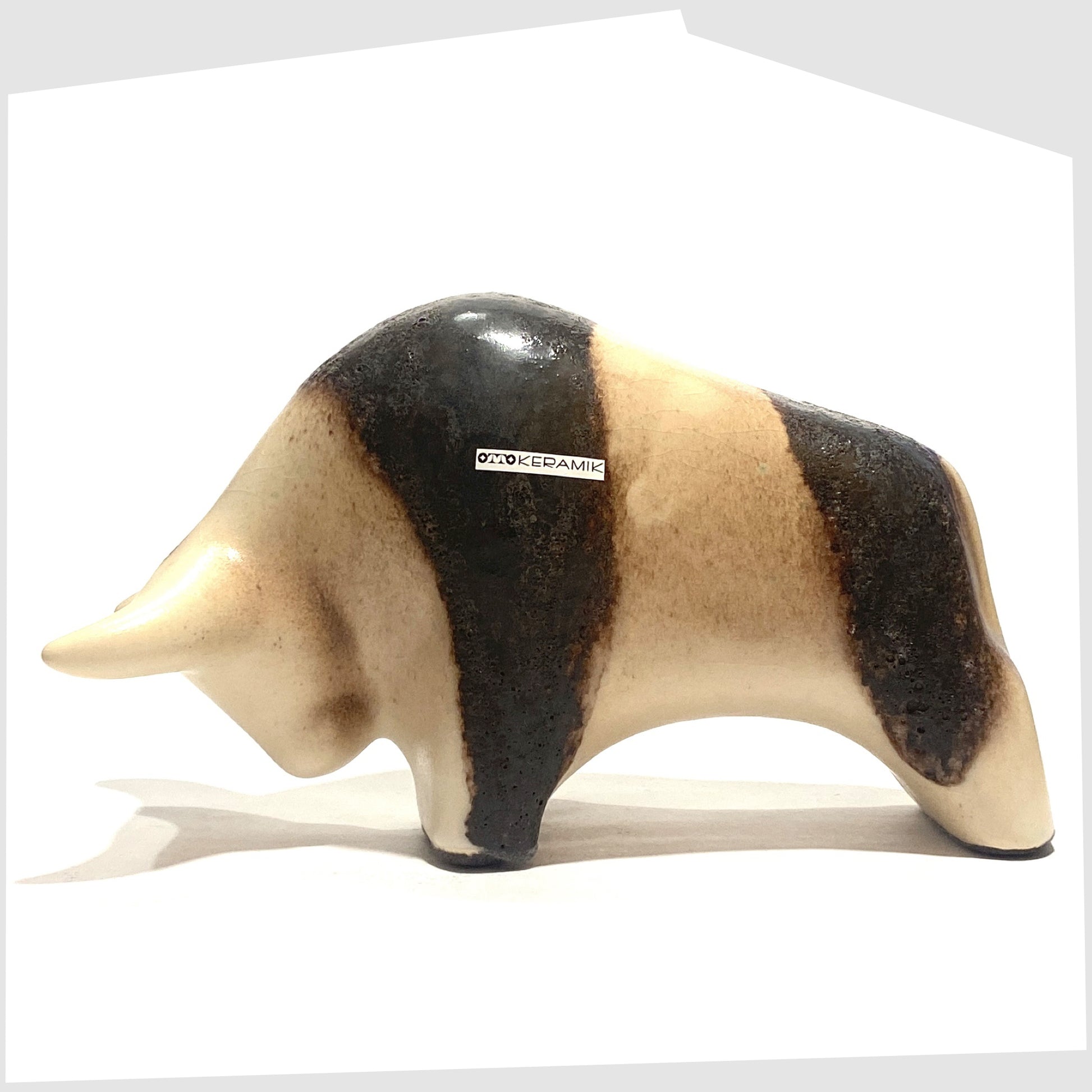 Otto Keramik Bull in natural glaze with bands of dark brown fat lava