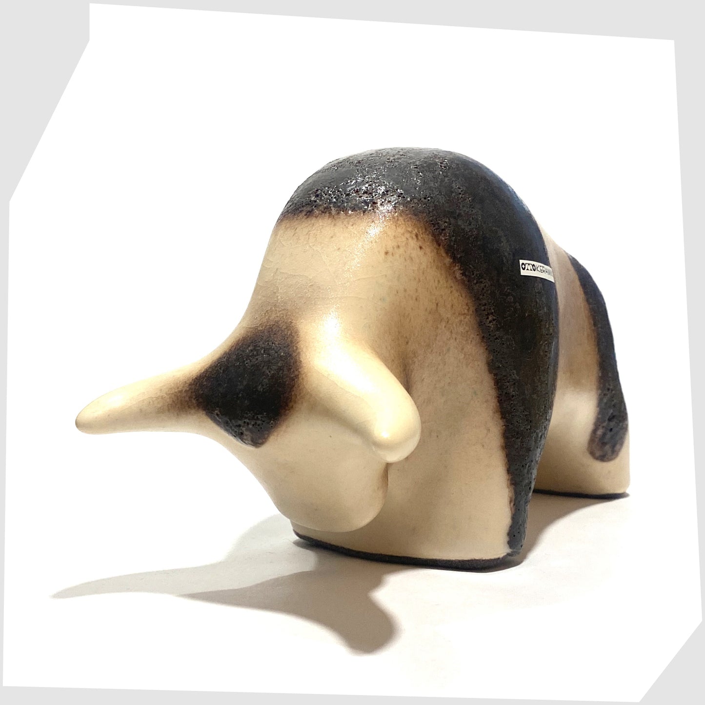 front horns of the Otto Keramik Bull in natural glaze with bands of dark brown fat lava