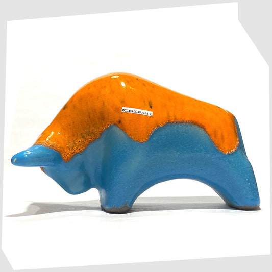 Otto Keramik Ceramic Bull in Orange Over Blue glaze, shown on a white background