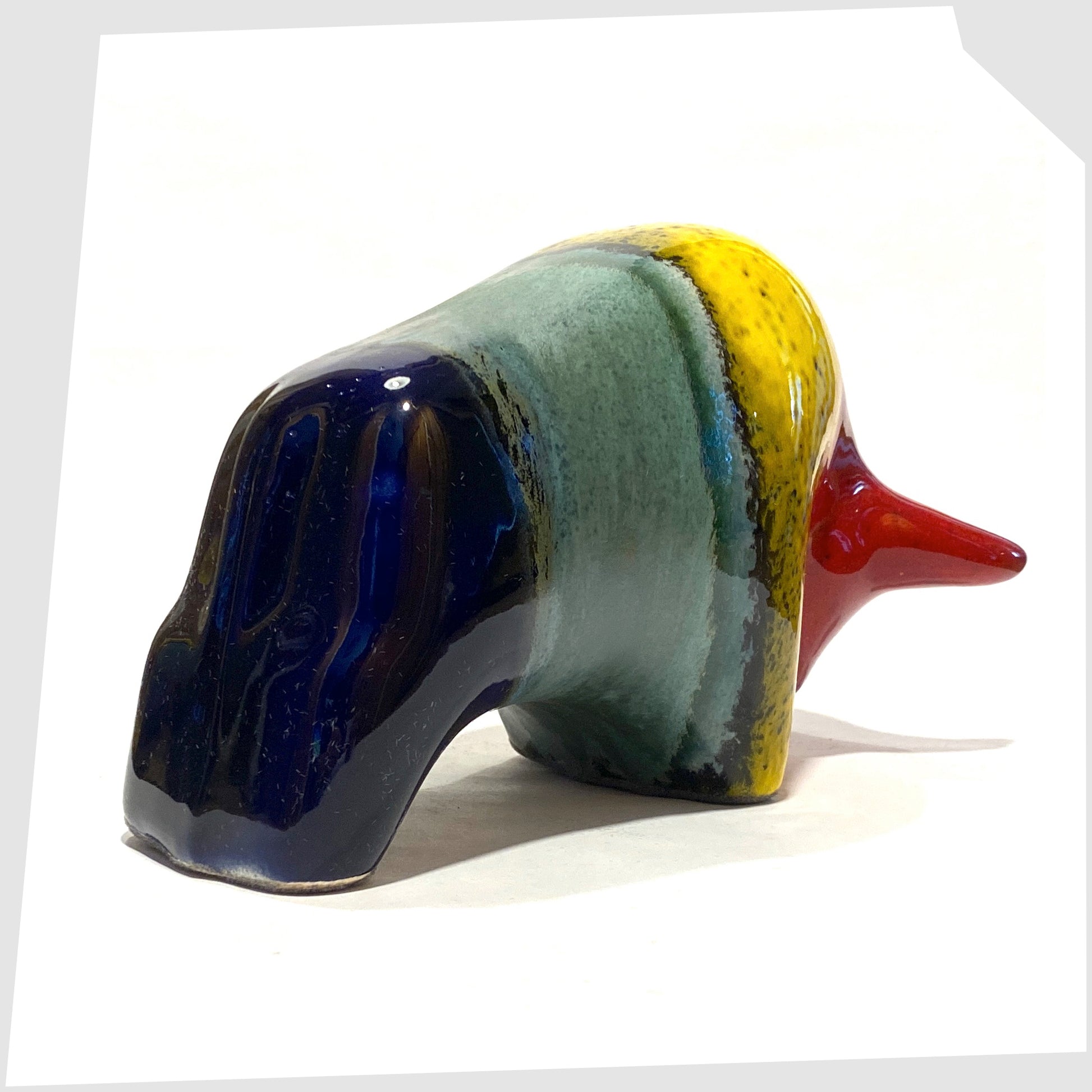rear of the otto keramik ceramic bull shaped ornament in multicoloured rainbow glaze