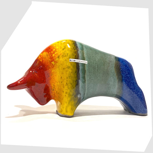 otto keramik ceramic bull sculpture in rainbow glaze of red, yellow, green and blue stripes