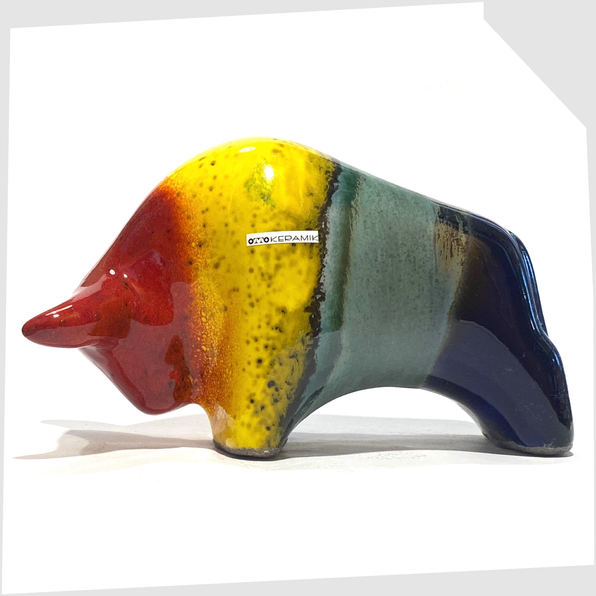 otto keramik ceramic bull shaped ornament in multicoloured rainbow glaze