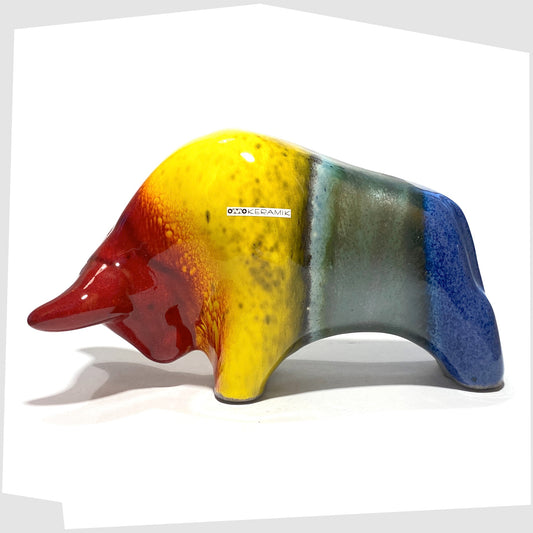 otto keramik ceramic bull sculpture in rainbow glaze of red, yellow, green and blue stripes