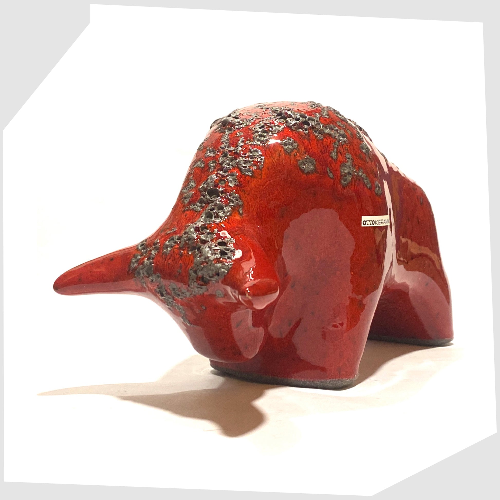 otto keramik ceramic bull-shaped sculpture in red glaze with grey fat lava along the spine