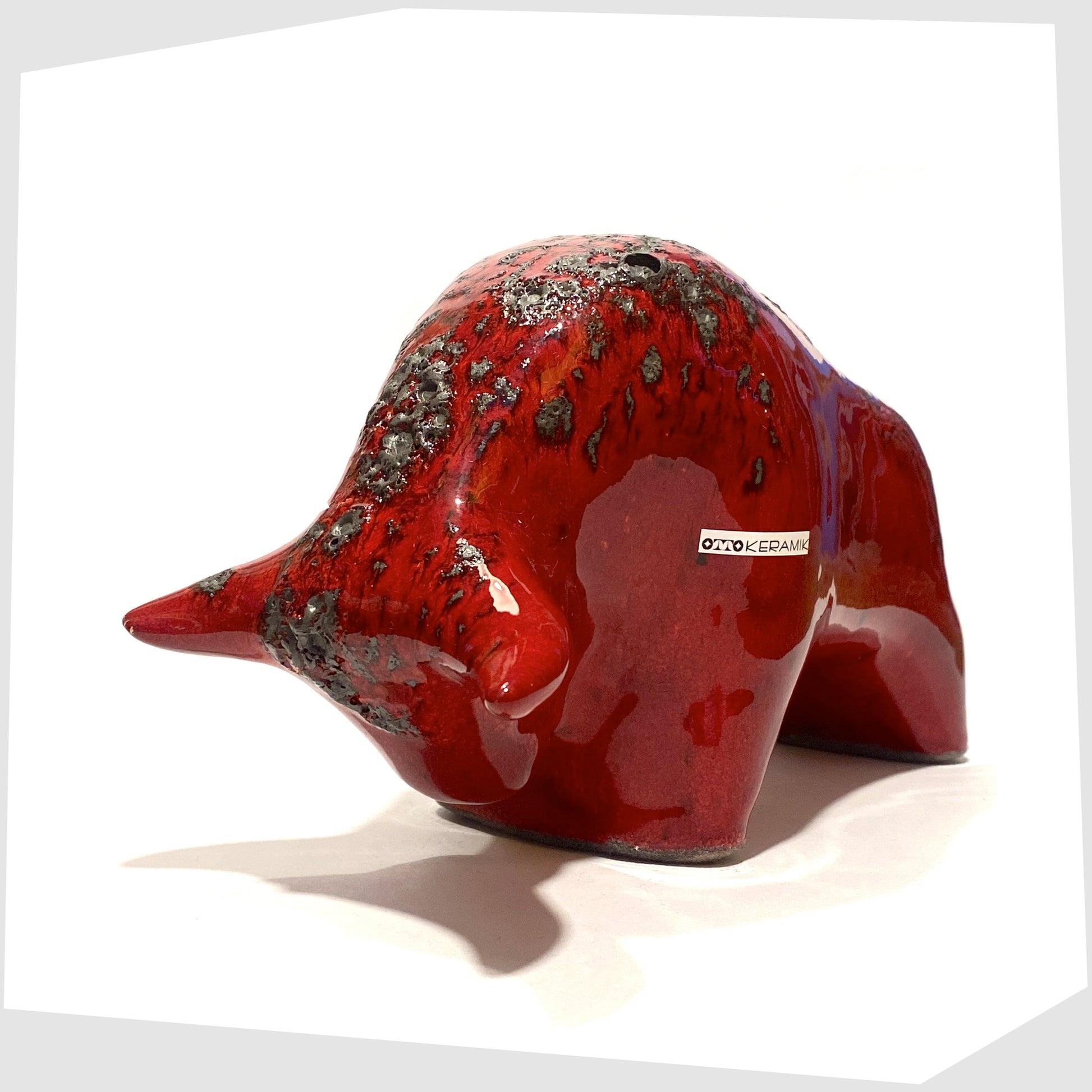 otto keramik ceramic bull-shaped sculpture in red glaze with grey fat lava along the spine