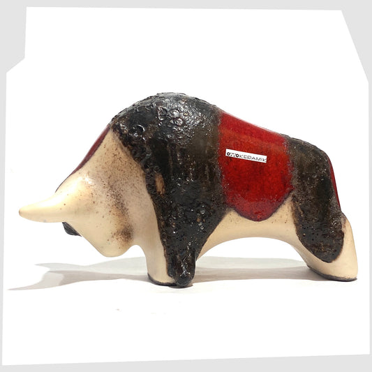 Otto Keramik ceramic bull in cream and red glaze with bands of thick fat lava, shown on a white background