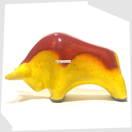 otto keramik bull-shaped sculpture in red over yellow glaze
