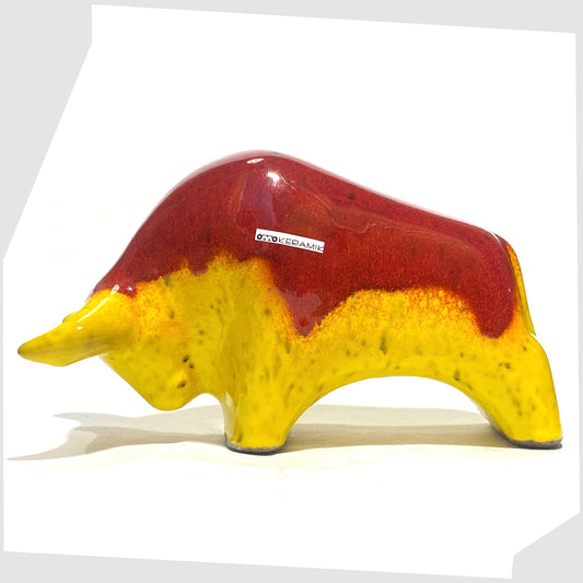 Otto Keramik Ceramic Bull in vibrant red over yellow glaze shown on a white background