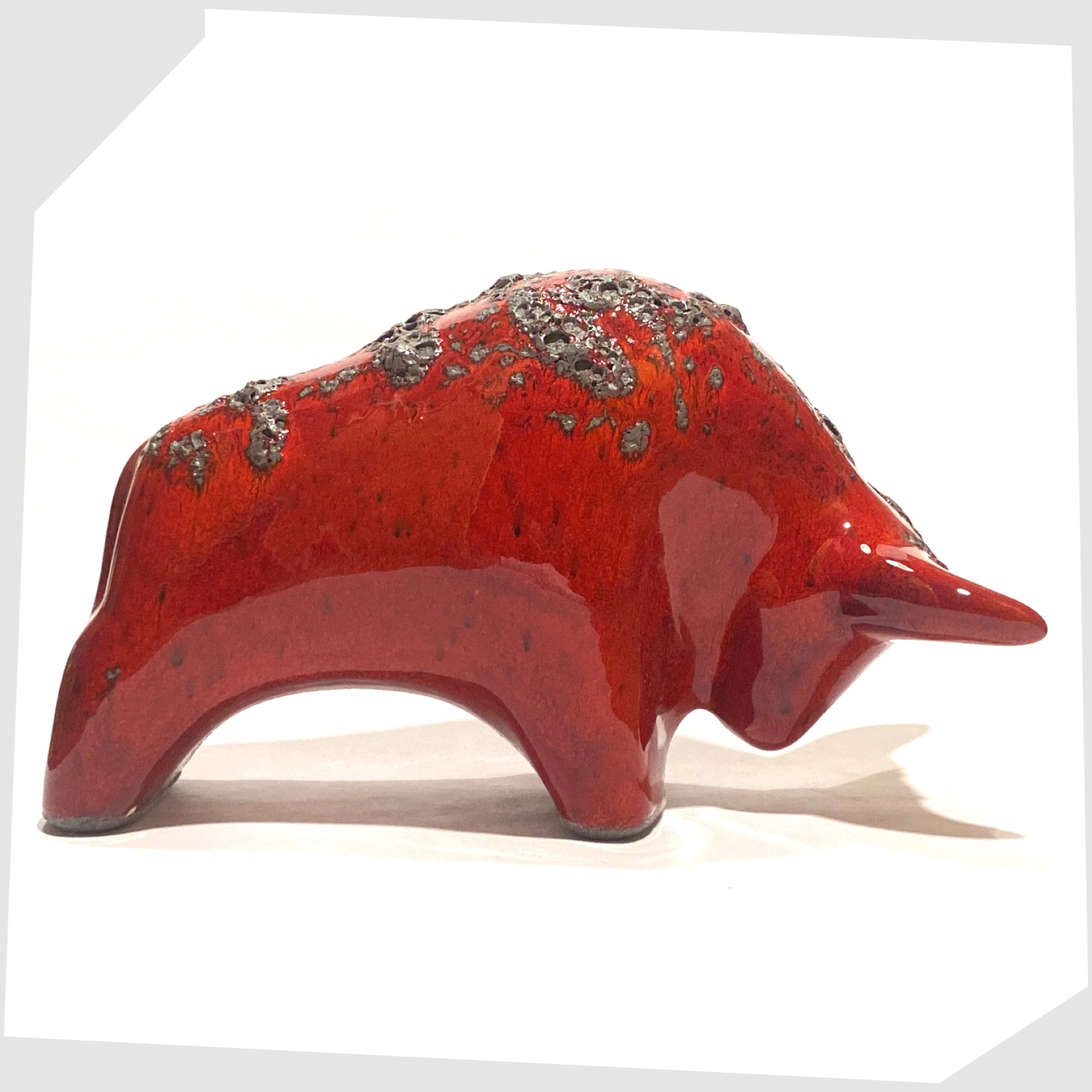 otto keramik bull sculpture, made of ceramic, in red glaze with grey fat lava along the spine